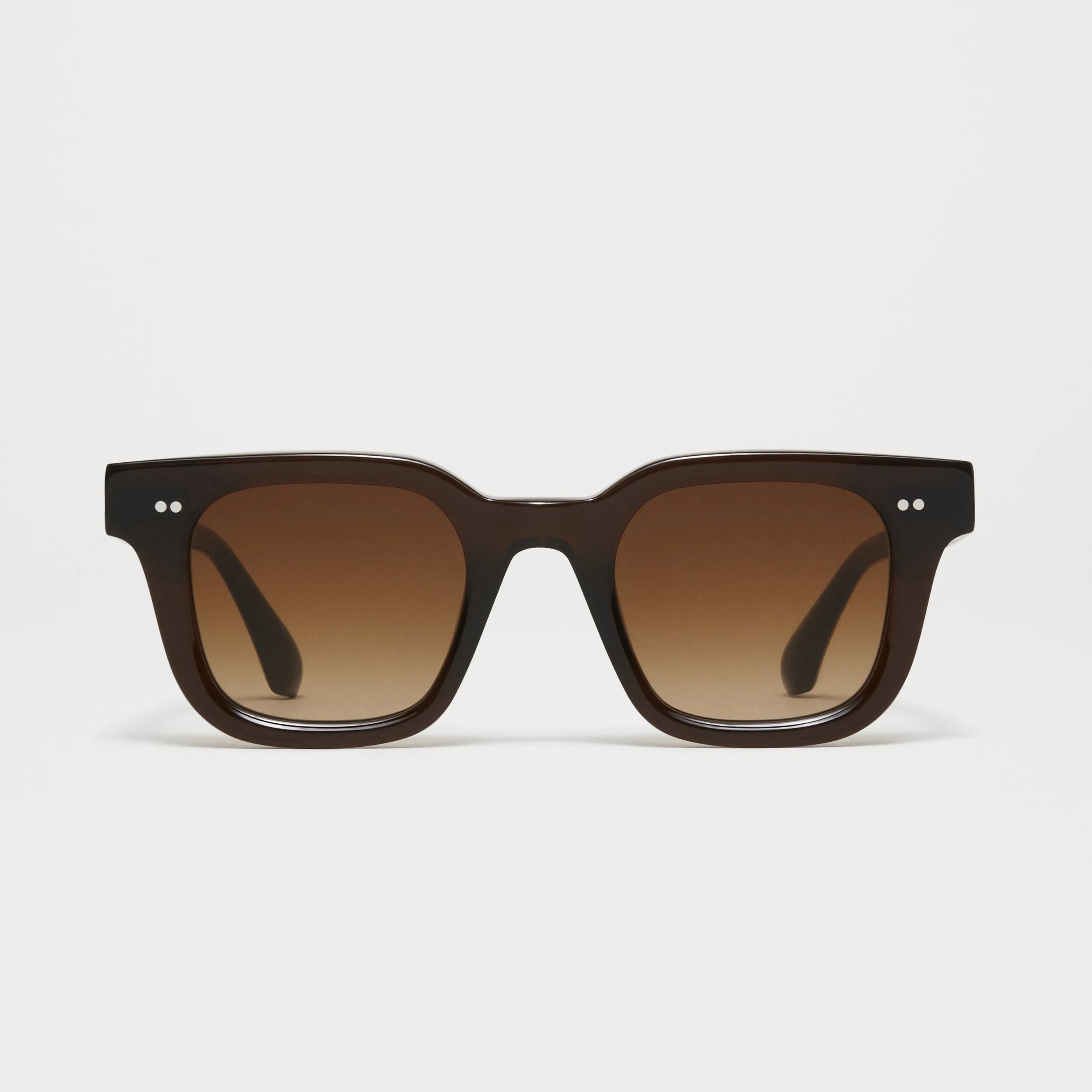 04 Core Brown Sunglasses with dark lenses and a stylish frame, ideal for UV protection and comfort.