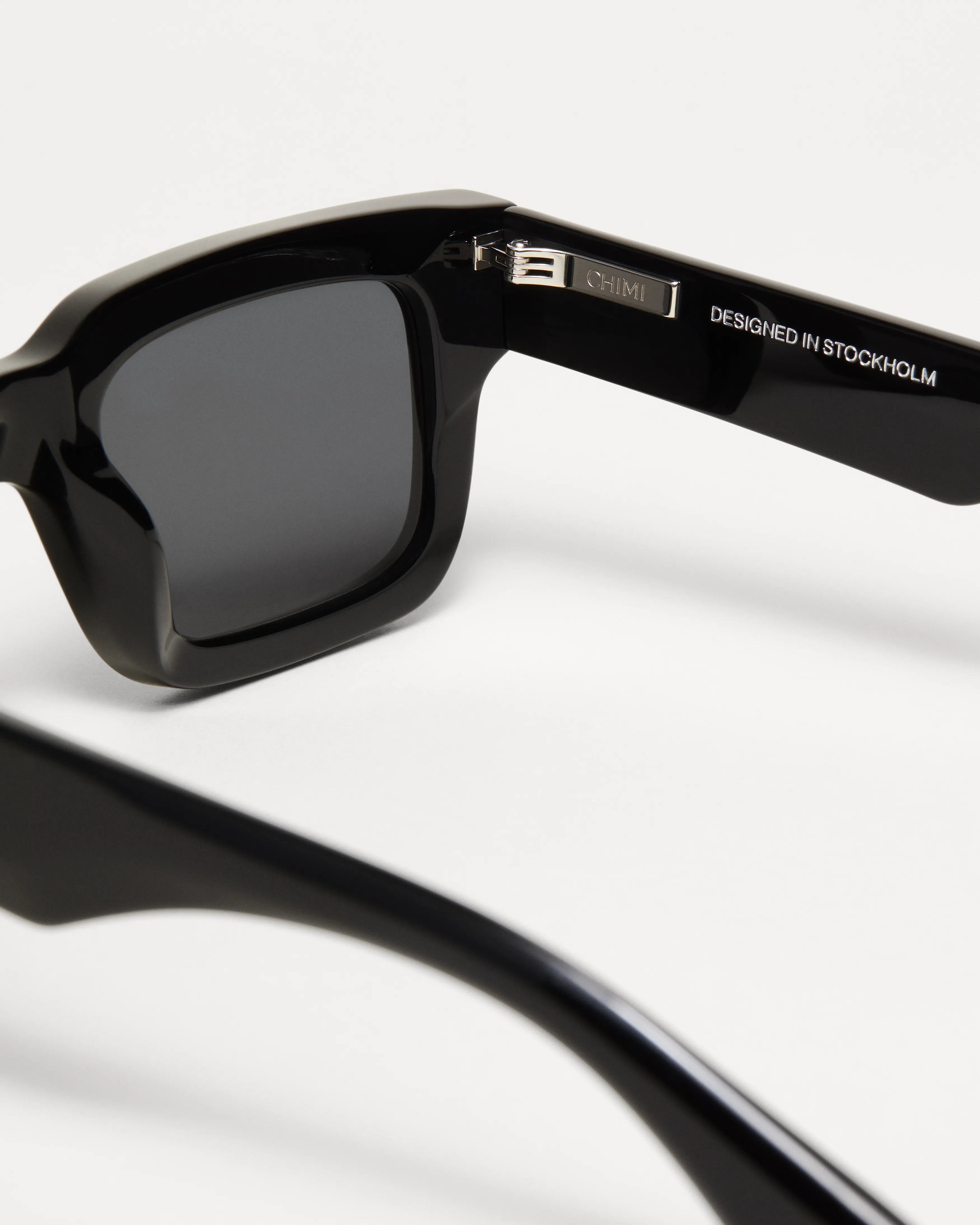 Close-up of 05 Core Black Sunglasses showcasing the stylish frame and lenses.