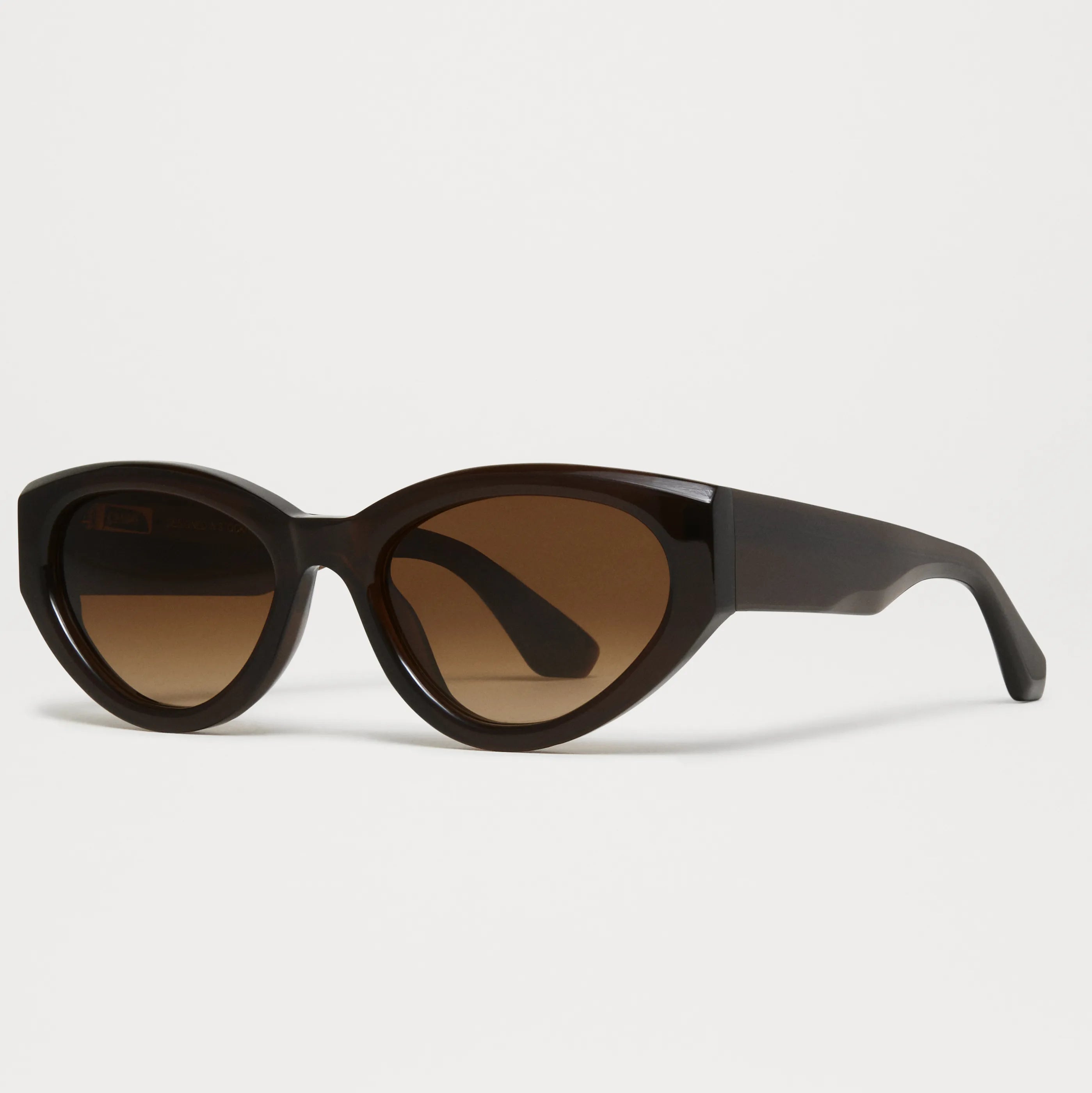 06 Core Brown Sunglasses featuring durable Acetate Renew™ frames and anti-scratch lenses for UV protection.