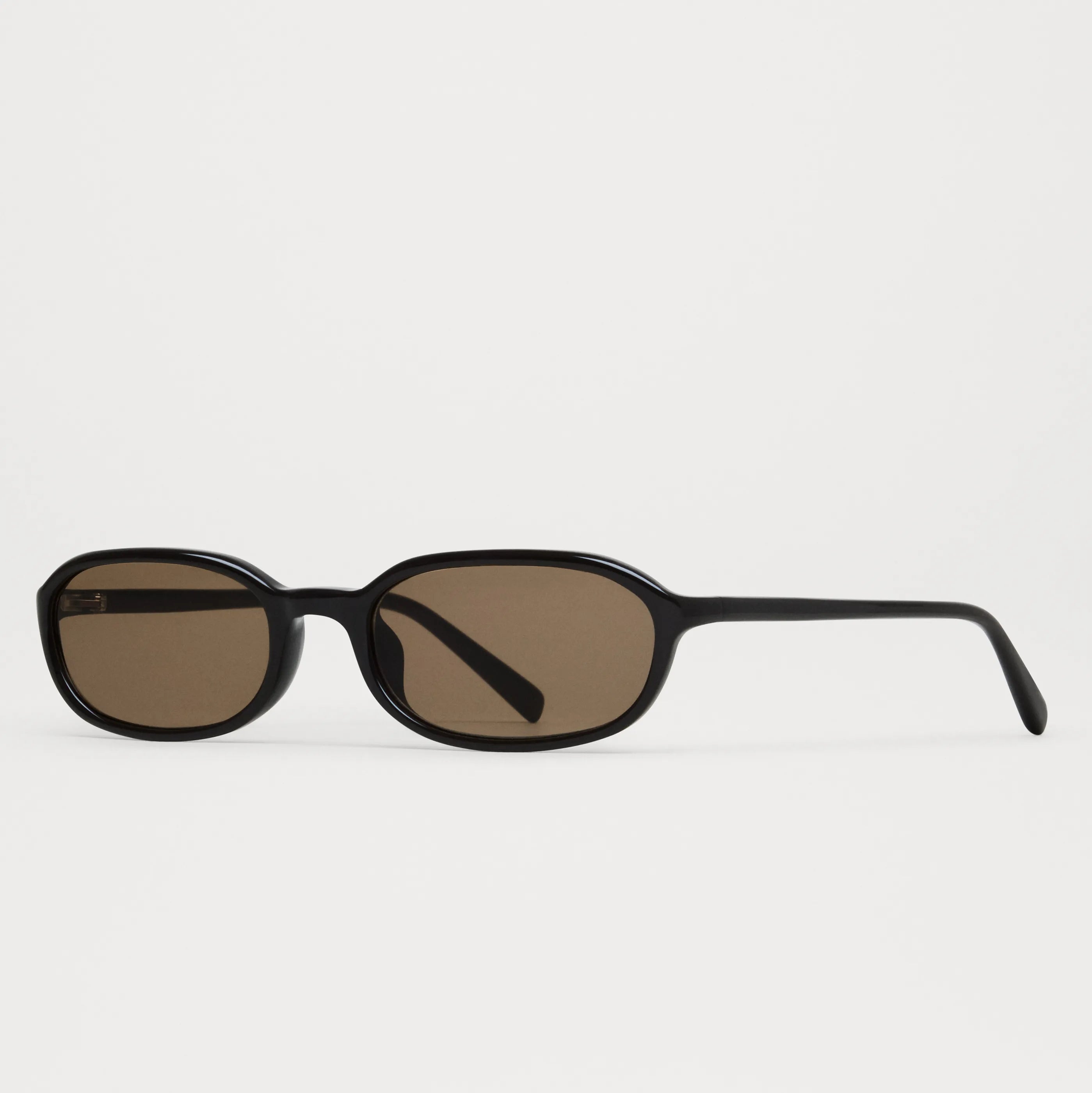 Edith Dark Brown Sunglasses with anti-scratch lenses and adjustable Acetate frames.