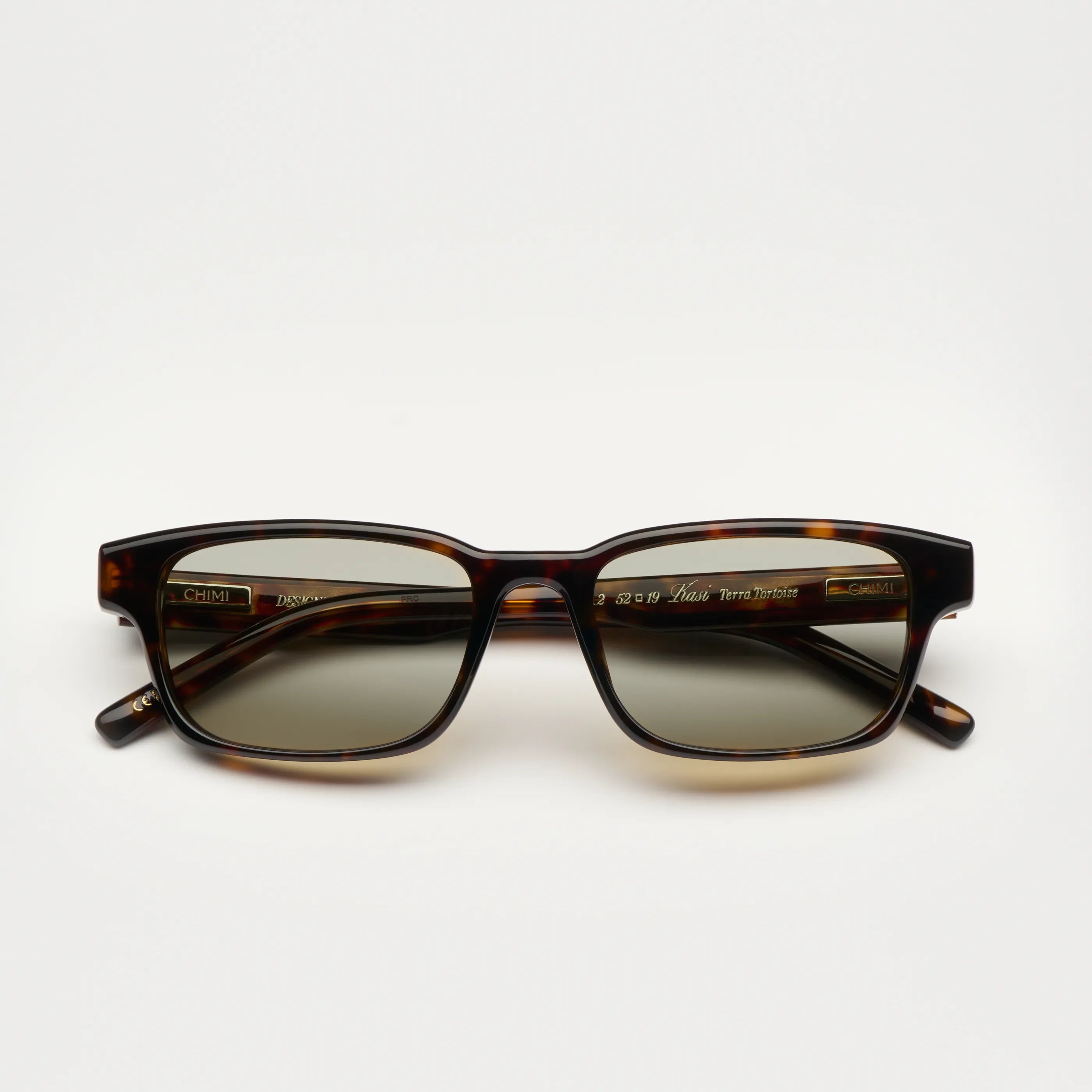 Kasi Terra Tortoise Sunglasses front view showcasing stylish tortoise shell design and anti-scratch lenses.