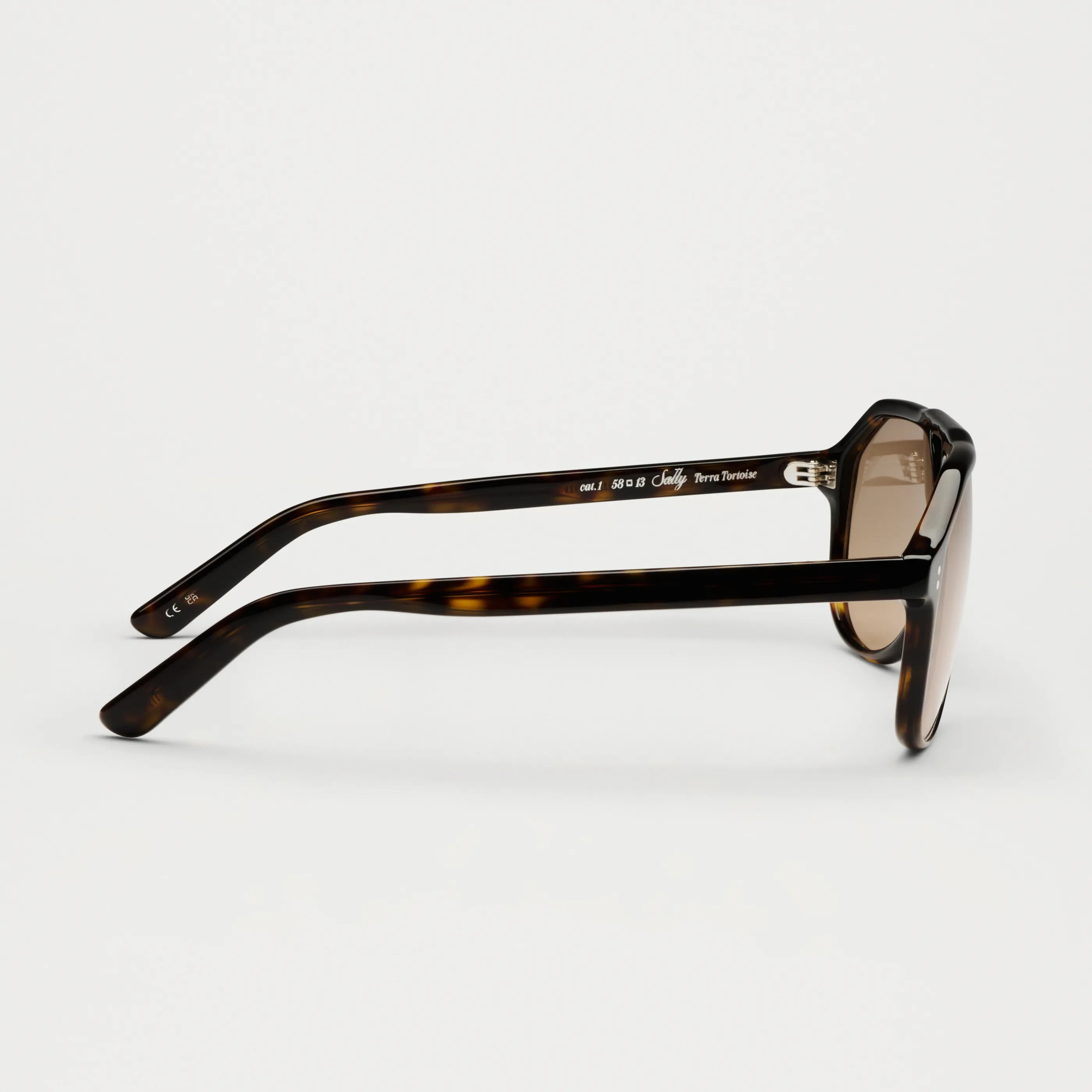 Sally Terra Tortoise Sunglasses side view showcasing durable frame and anti-scratch lenses.