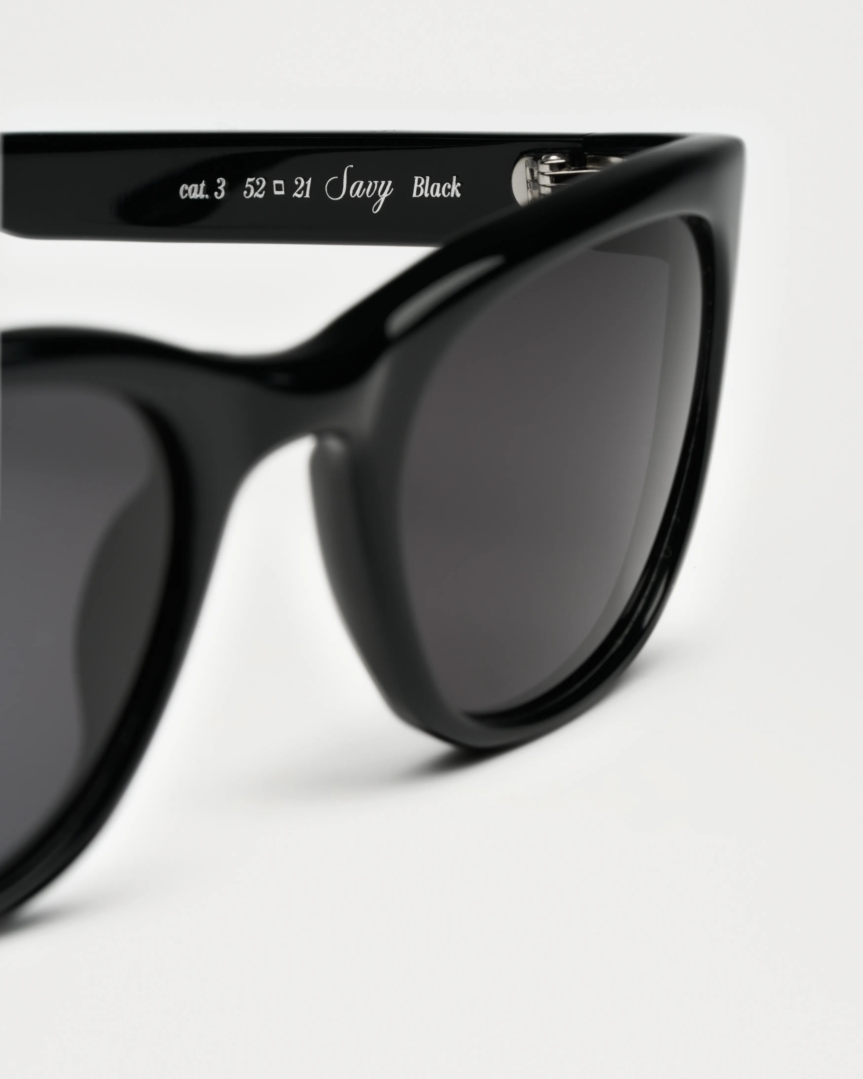 Savy Black Sunglasses close-up showing stylish frame and anti-scratch lenses in durable Acetate material.