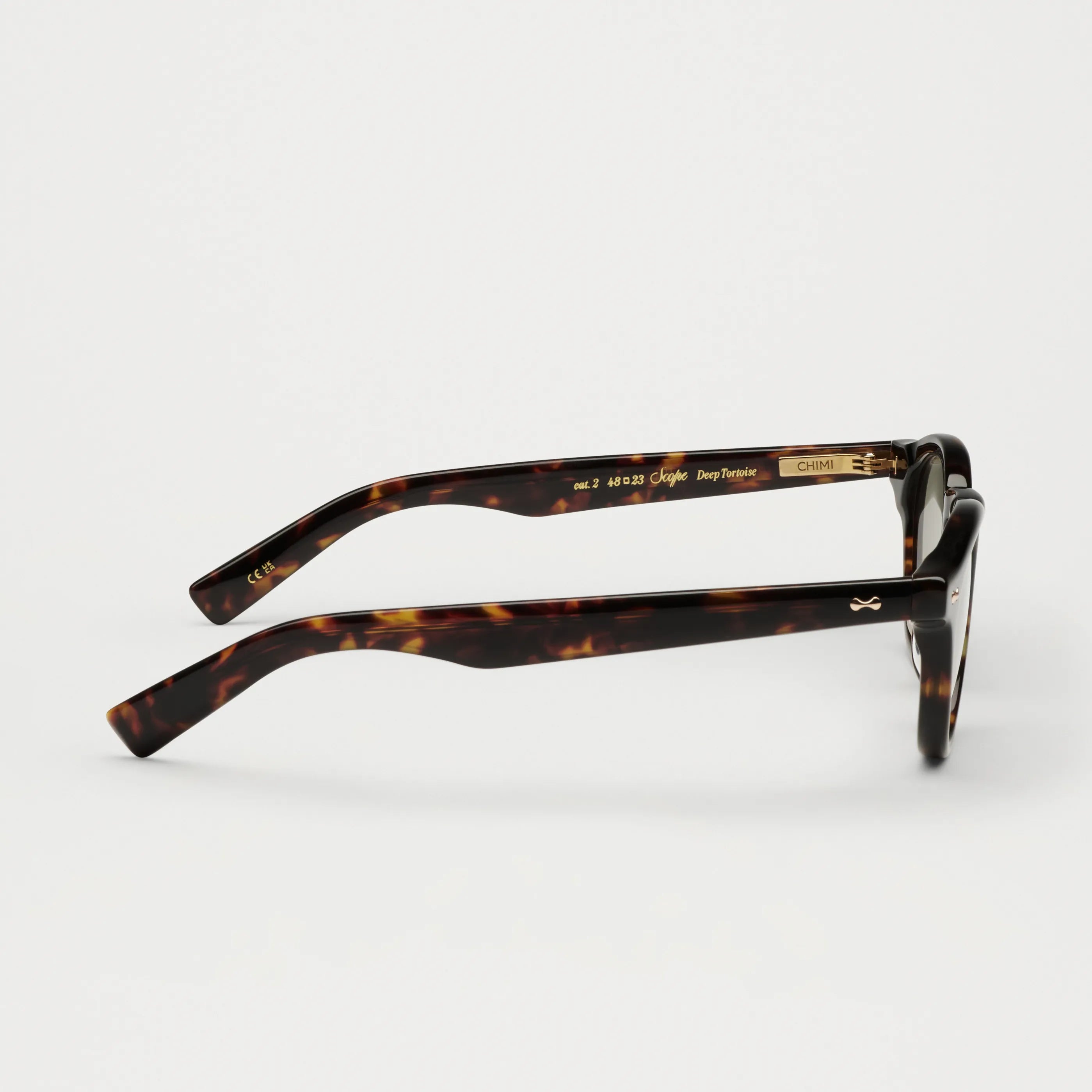 Scope Tortoise Sunglasses side view showcasing the durable acetate frame and stylish design.