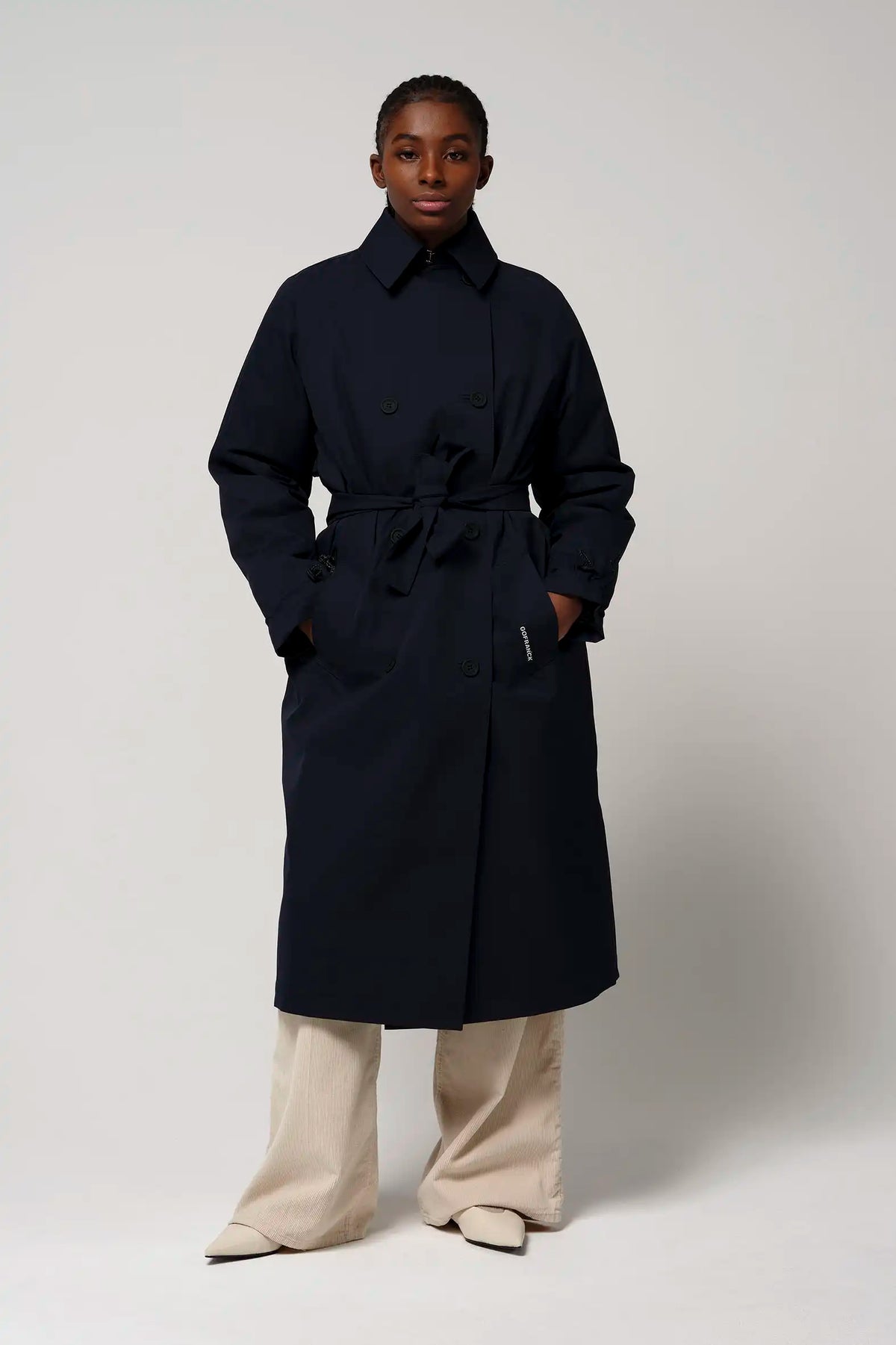 Gale Sky Captain Blue Parka model wearing a casual loose fit coat with belt and pockets.