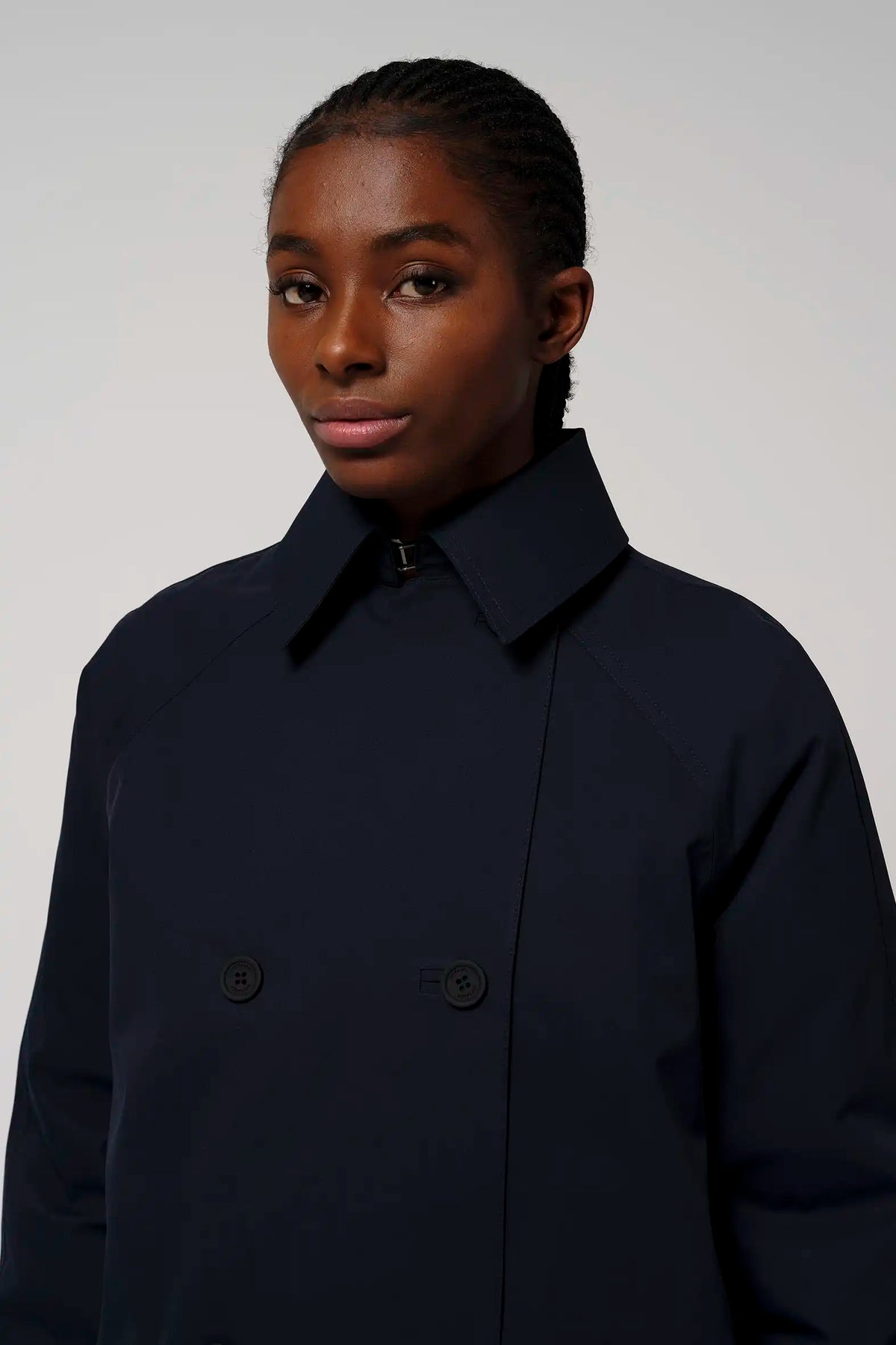 Gale Sky Captain Blue Parka worn by a model, showcasing its stylish design and high-quality materials.
