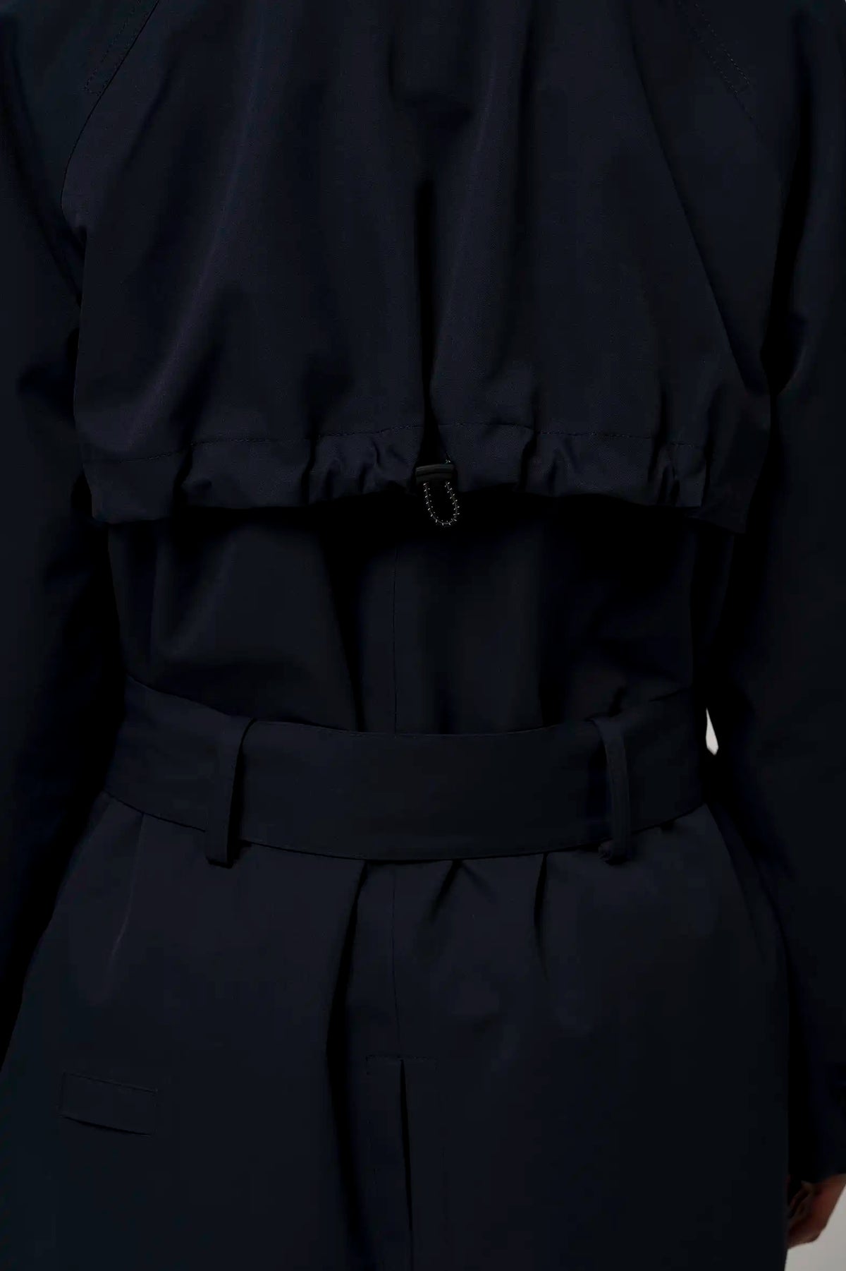 Back view of Gale Sky Captain Blue Parka showcasing the adjustable back yoke and waist belt.