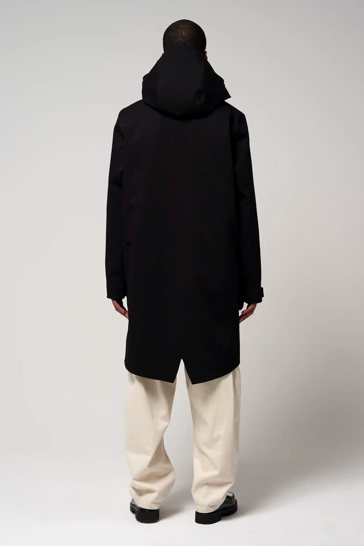 Back view of the Raiden Deep Black Parka showcasing its stylish design and adjustable hood.