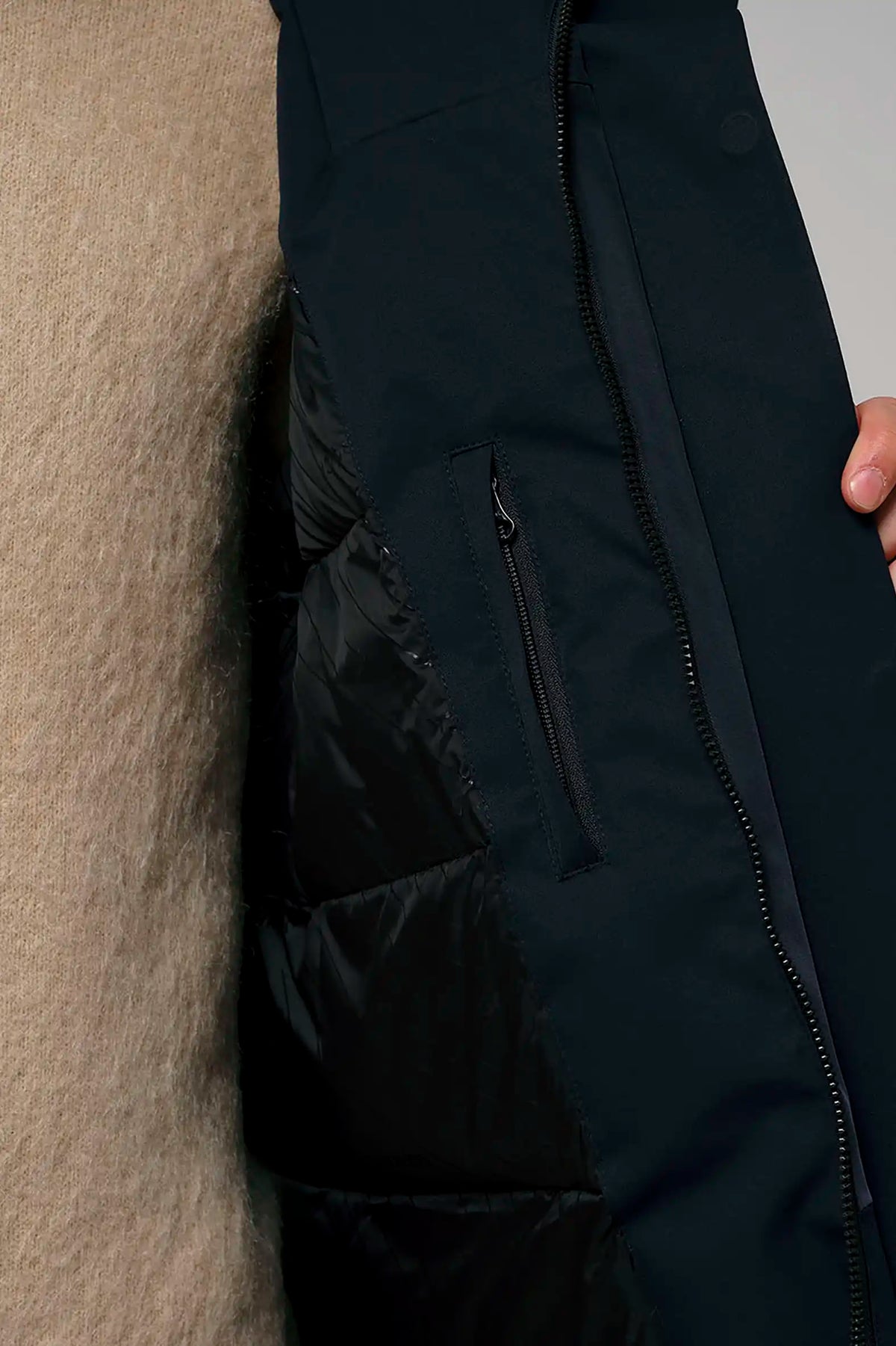 Detail of the Stratus Sky Captain Blue Parka showcasing inside pocket and lining.