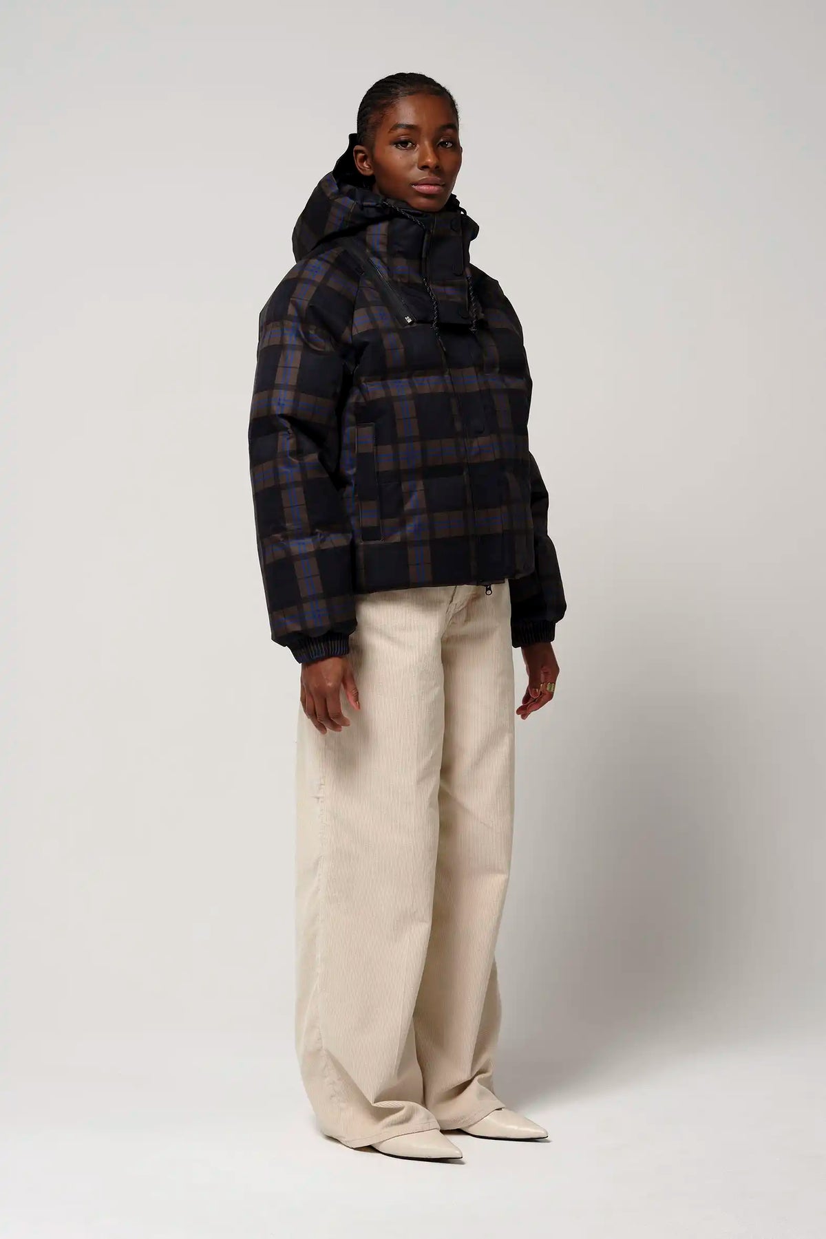 Talon Blue Tartan Check Coat displayed on model, featuring waterproof and windproof materials.