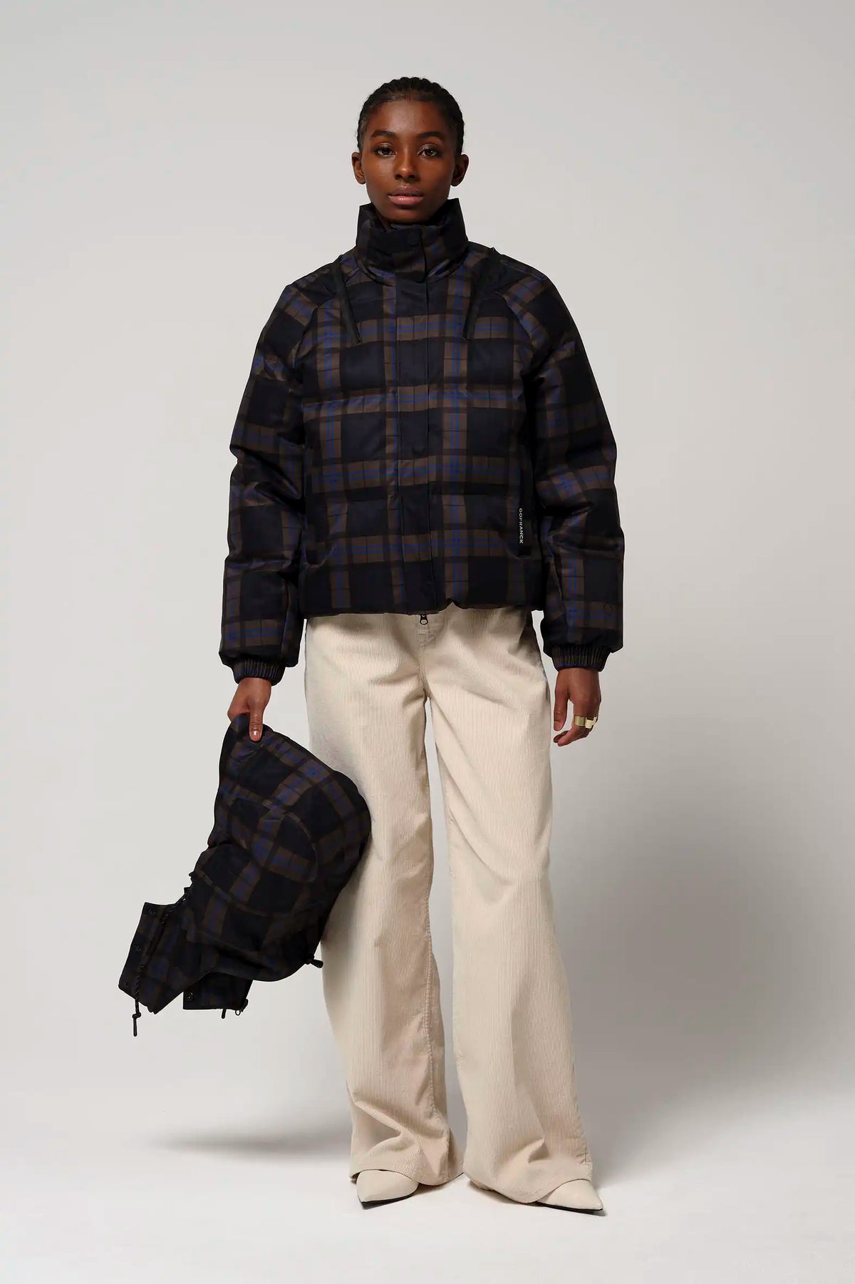 Talon Blue Tartan Check Coat displayed by model, showcasing stylish and functional outdoor wear.