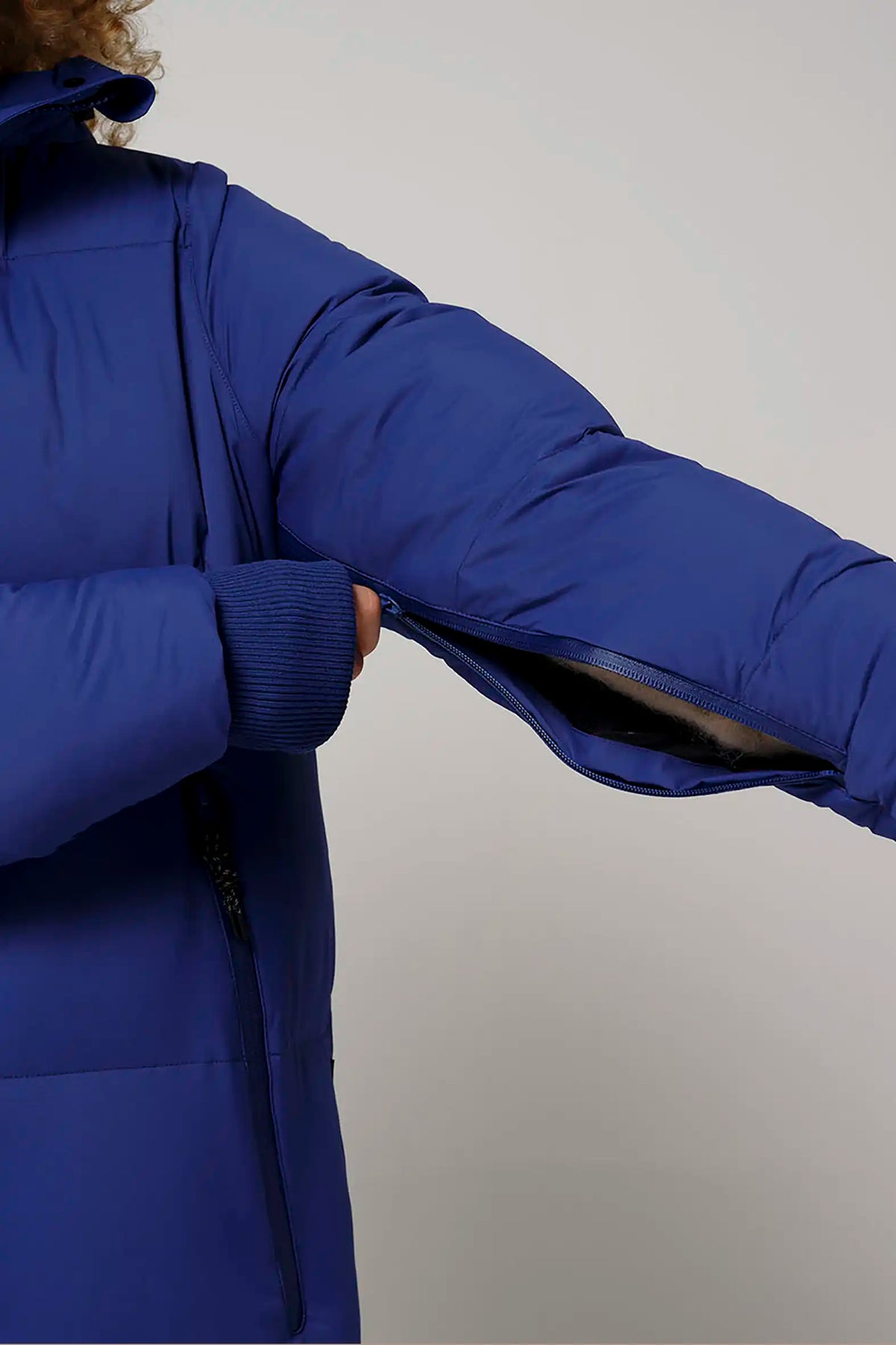 Tsunami Sodalite Blue Coat showing sleeve zipper detail for comfort and breathability.