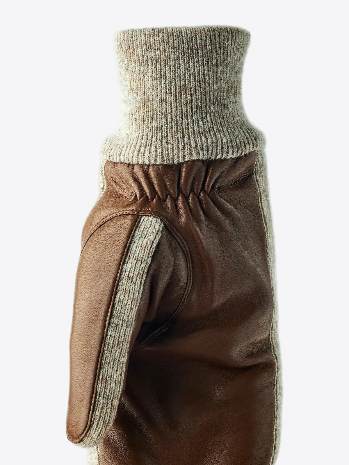 Jeanne Mitt Light Brown Gloves by Hestra showcasing supple hairsheep leather and wool cuffs, ideal for chilly seasons.