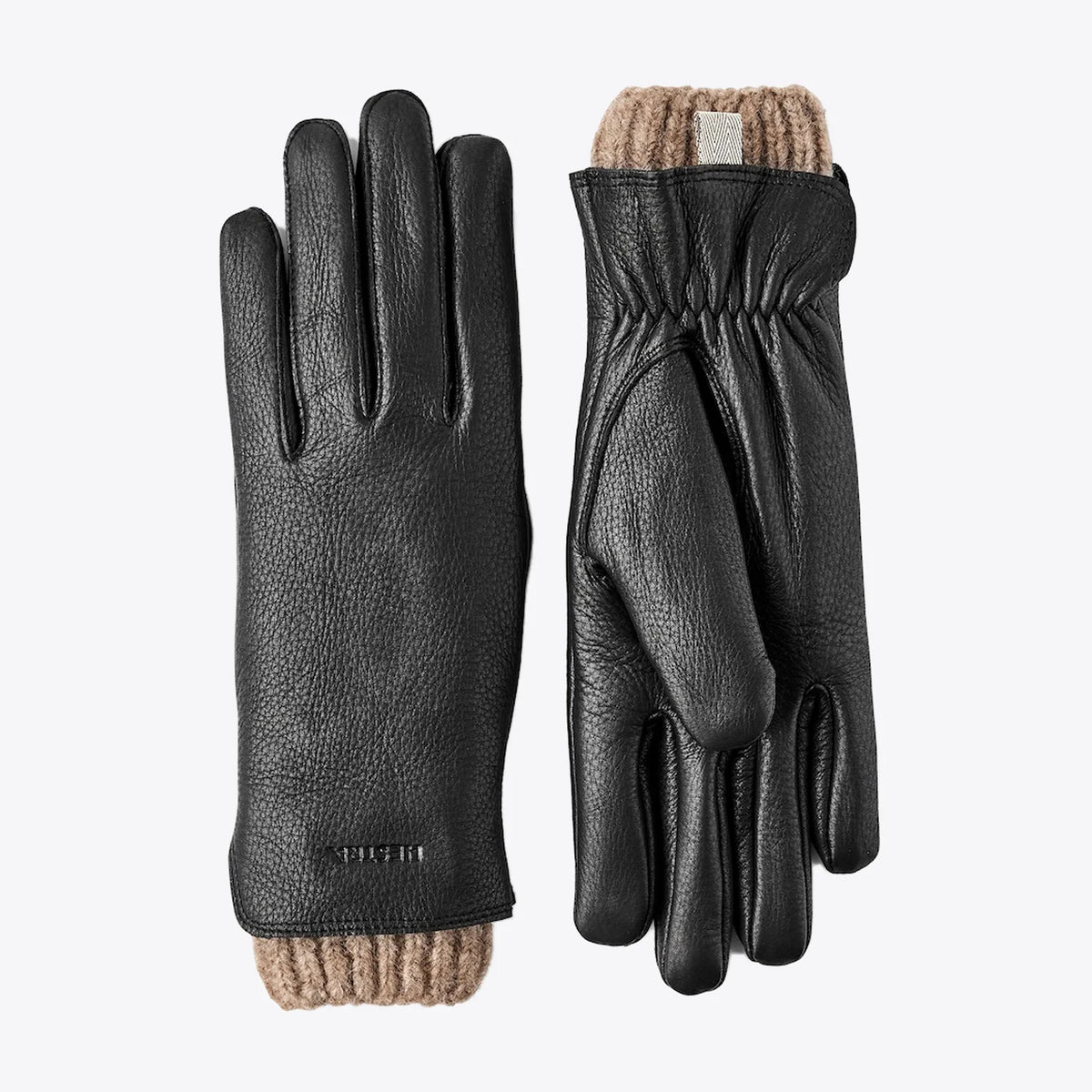 Tiril Black Gloves by Hestra, luxury women's gloves with soft deerskin and warm wool lining for optimal comfort.