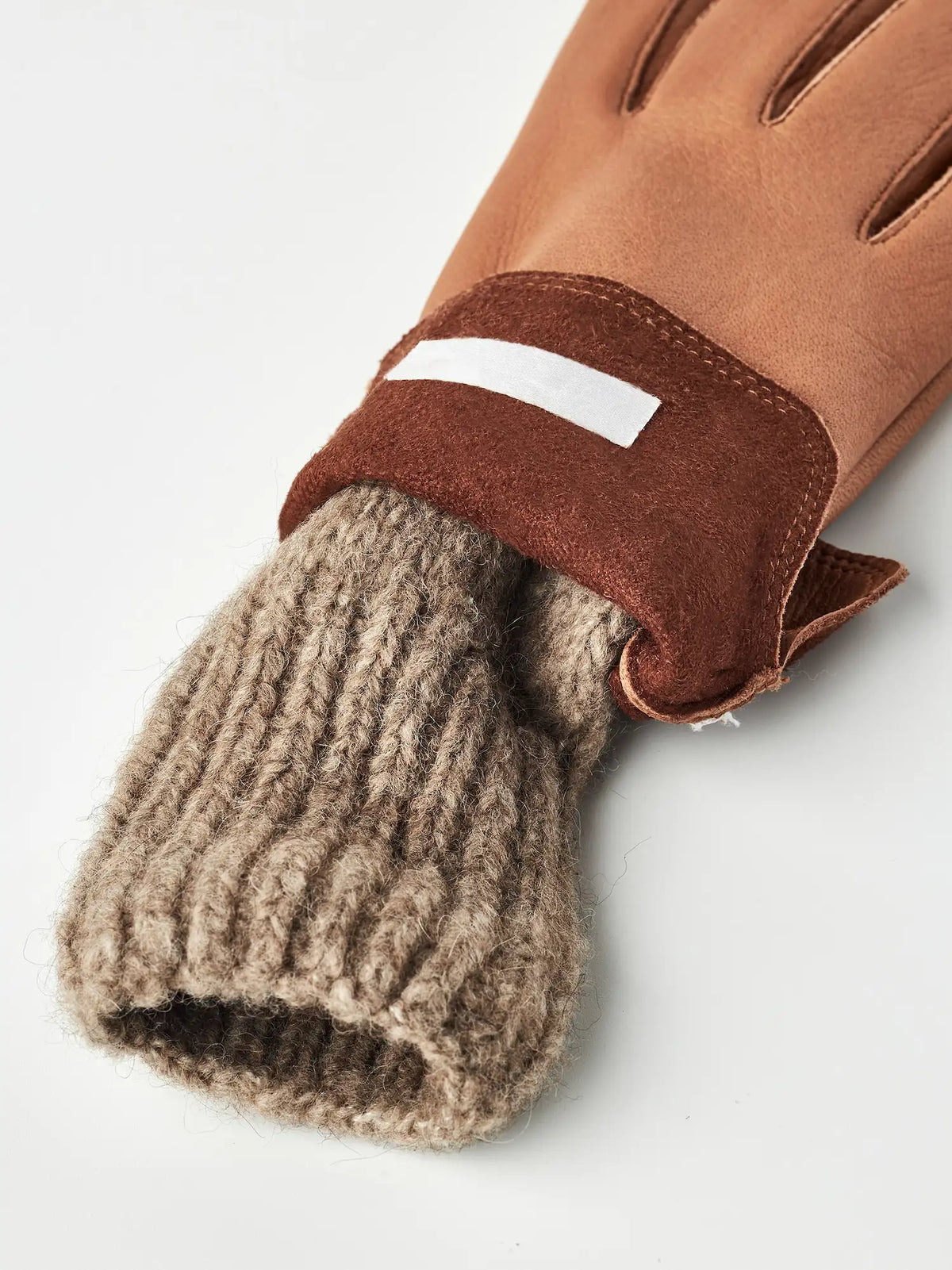 Tiril Cork Gloves by Hestra featuring supple deerskin leather and soft wool lining for warmth and comfort.