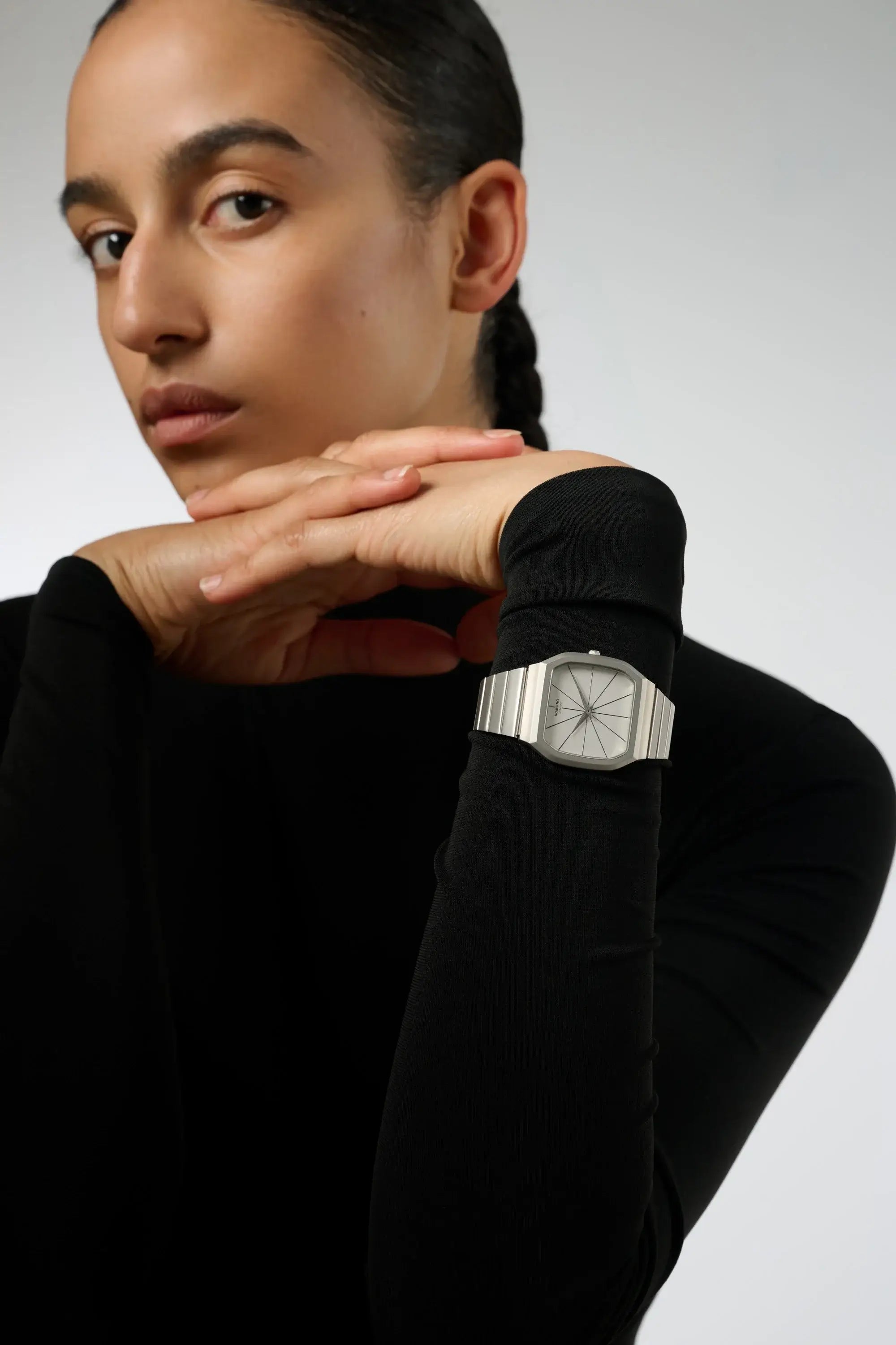Max Silver Moon Watch worn on a model's wrist, showcasing its stainless steel design and elegant style.