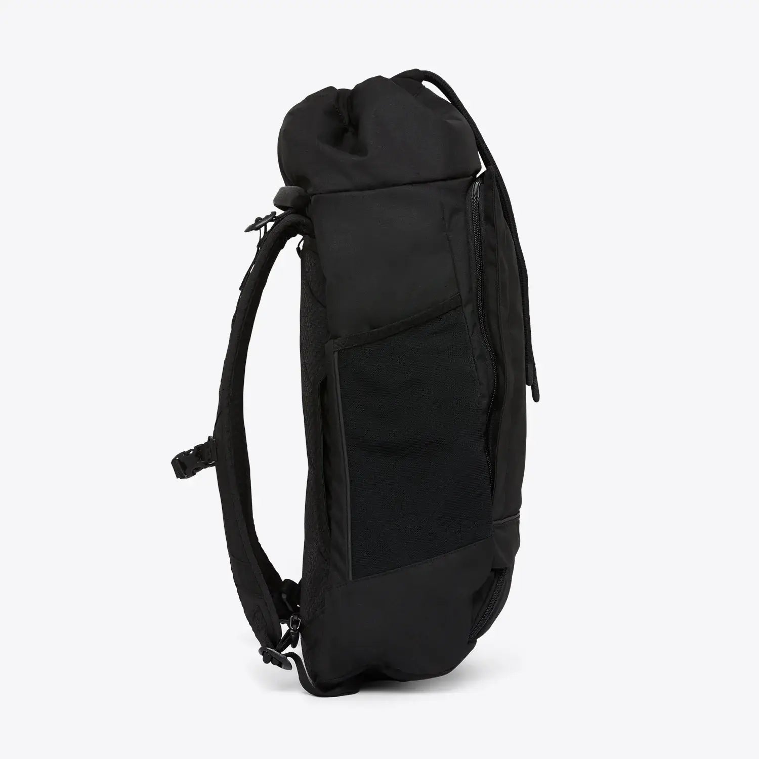 Blok Large Rooted Black Backpack side view showcasing its sleek design and storage compartments.
