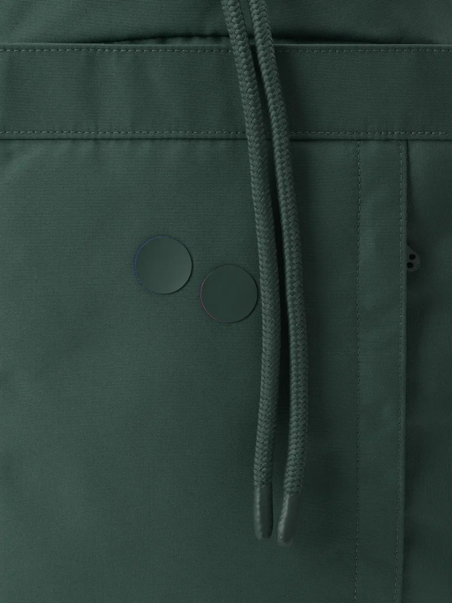 Blok Medium Cosmo Green Backpack close-up showing water repellent fabric and drawstring details.