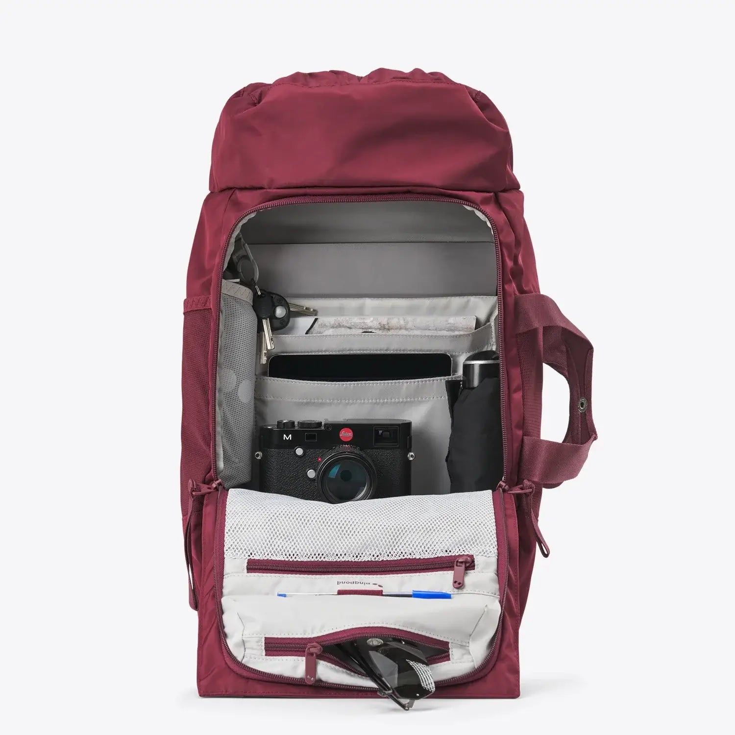 Blok Medium Glazed Red Backpack interior compartments with camera, laptop, and storage pockets.