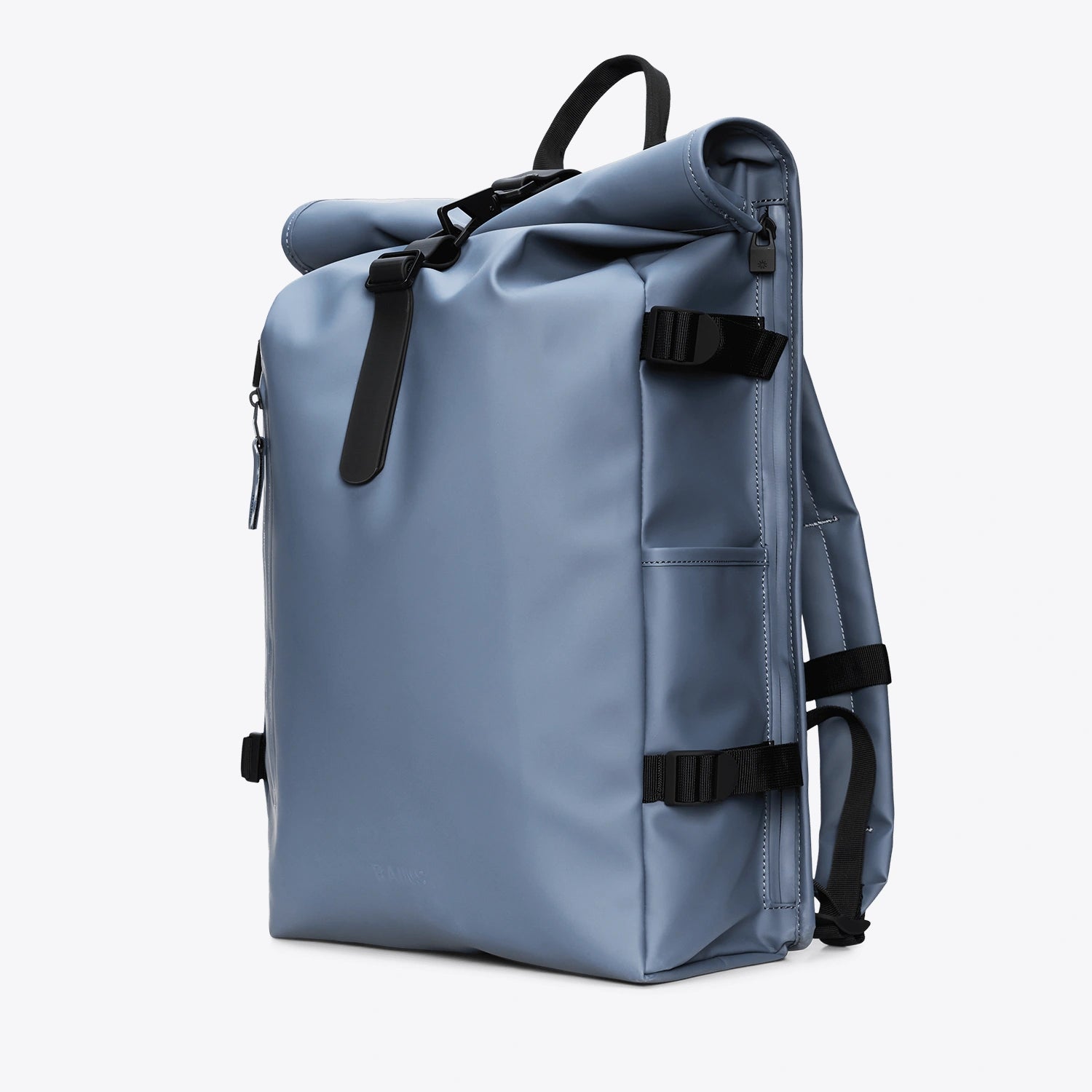 Rolltop Rucksack Large Blue Dusk Backpack showing side view with waterproof design and roll-top closure.