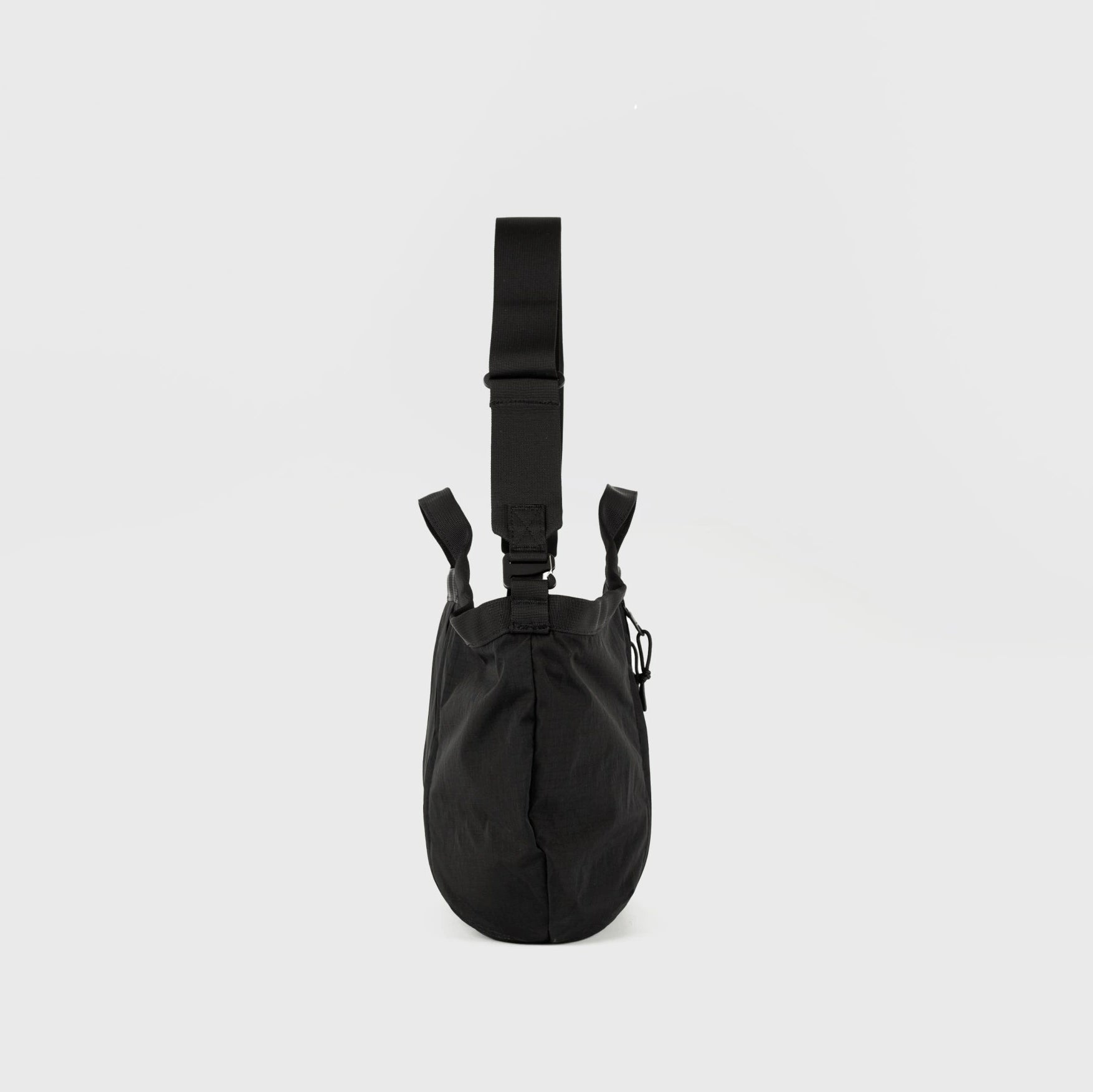 Grid Crossbody Bag Black Shoulder Bag side view with adjustable strap and durable design.
