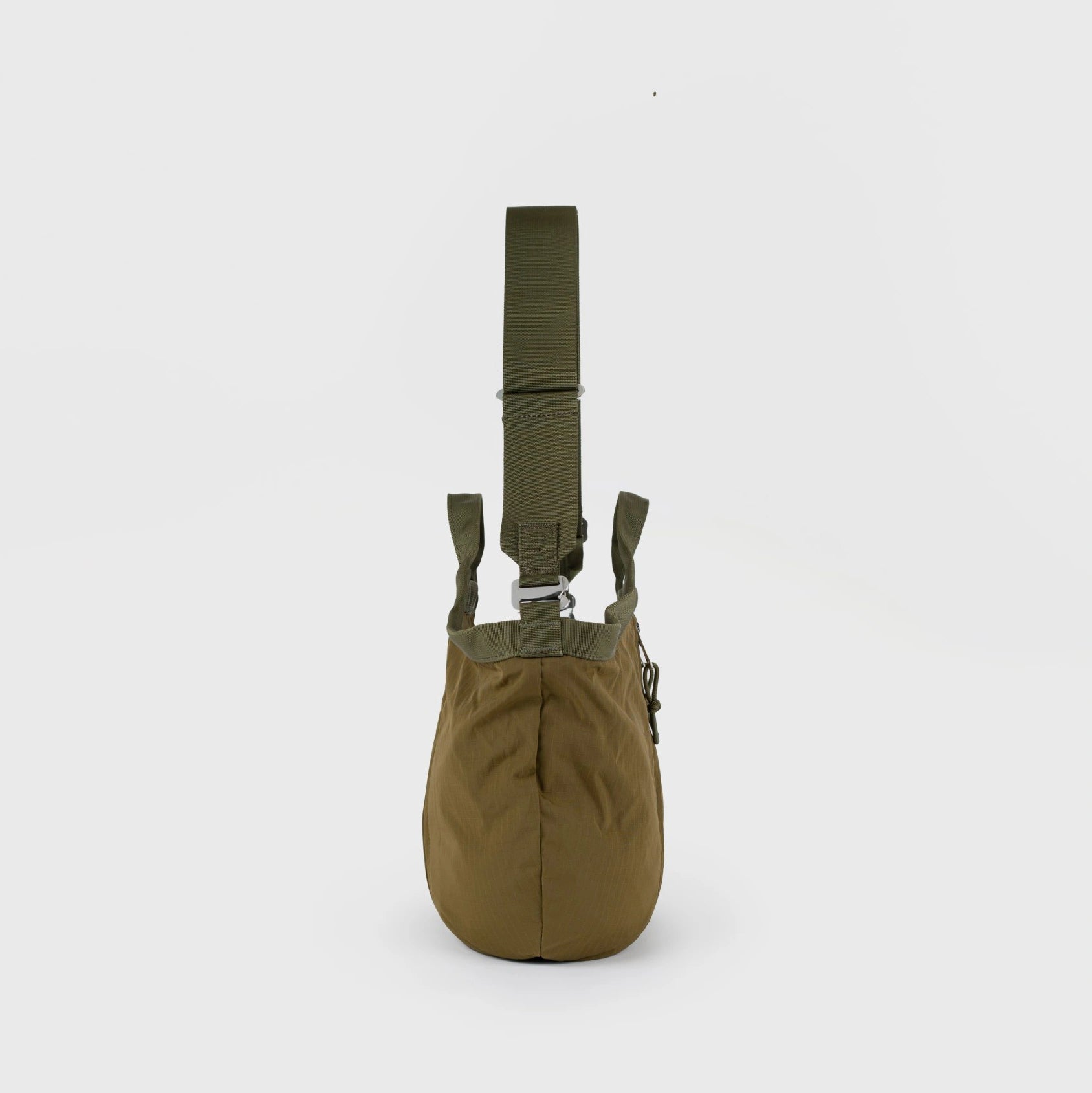 Grid Crossbody Bag Olive Shoulder Bag shown from the back with adjustable strap and lightweight water resistant material.