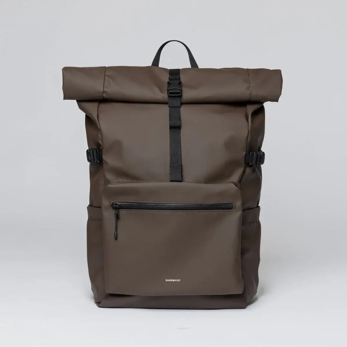 Stream Rolltop Backpack L Brown Backpack with roll-top closure and front zip pocket.