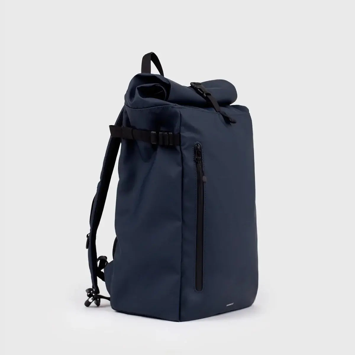 Stream Slim Rolltop M Navy Backpack side view with waterproof design and padded shoulder straps.