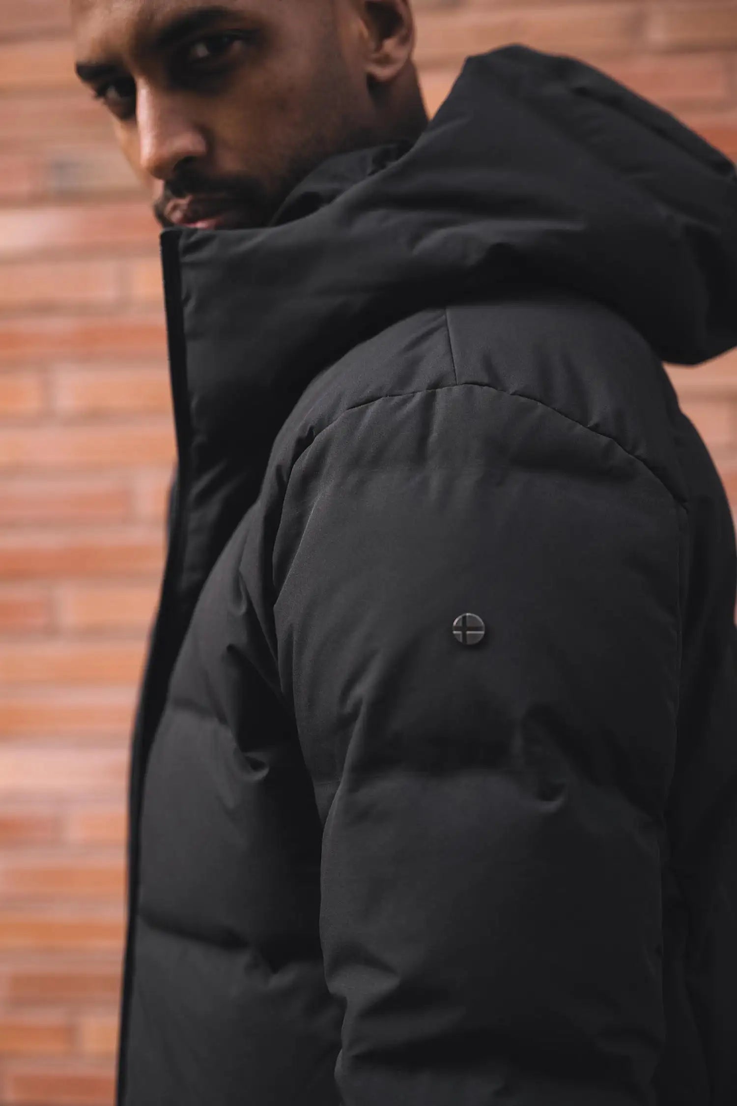 Torrent II Onyx Coat featuring a sleek black design and durable insulation.