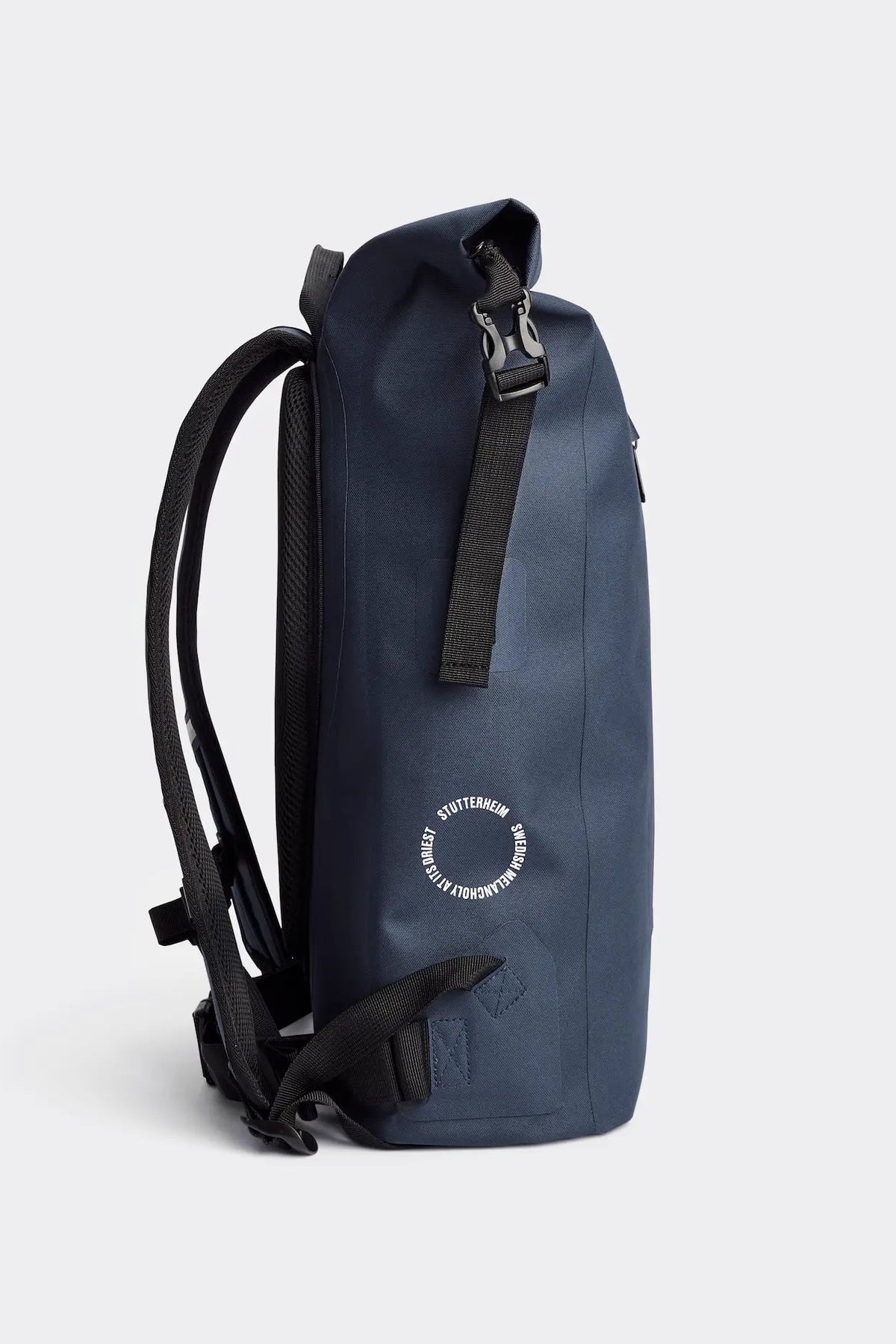 Rain Rolltop 25L Navy Backpack showcasing side view and rolltop design, ideal for waterproof protection and comfort.