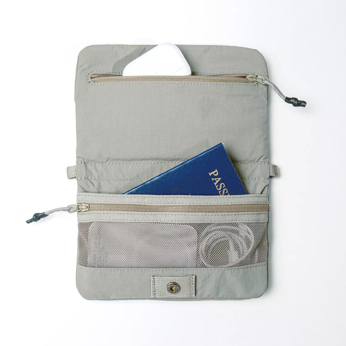 Phone Sacoche 90 Chambray Silky Peach Bag opened, showcasing compartments for phone and passport.