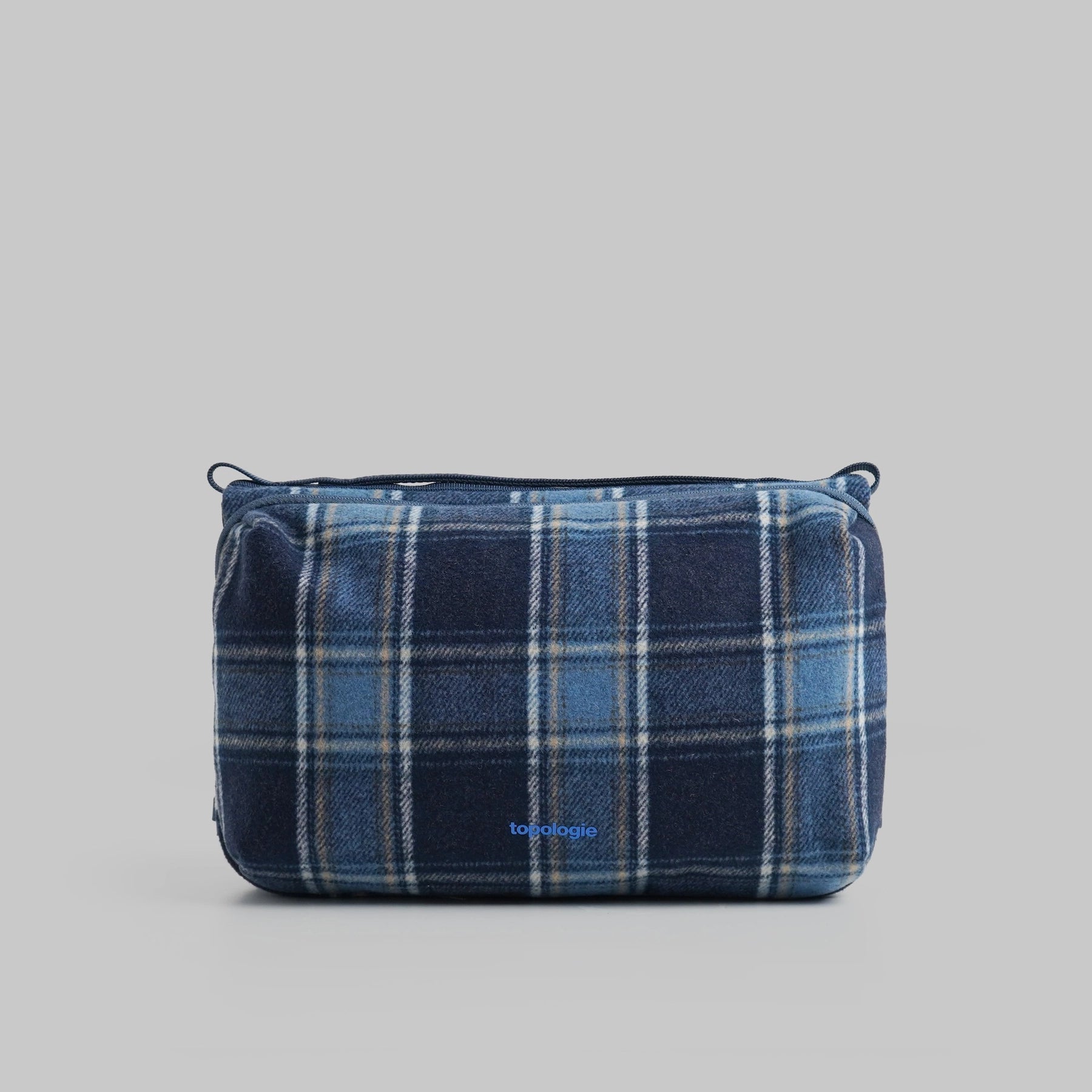 Bottle Sacoche Large Blue Check Wool Bag in navy with blue check pattern, made of water-repellent fabric.