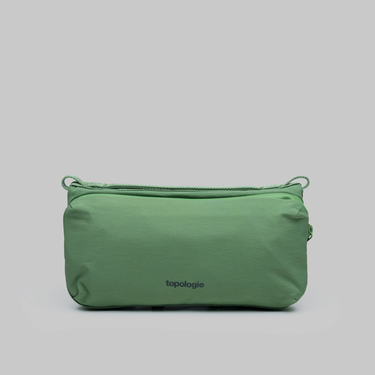 Bottle Sacoche Medium Ivy Green Papery Bag with two main zipped compartments and key hook.