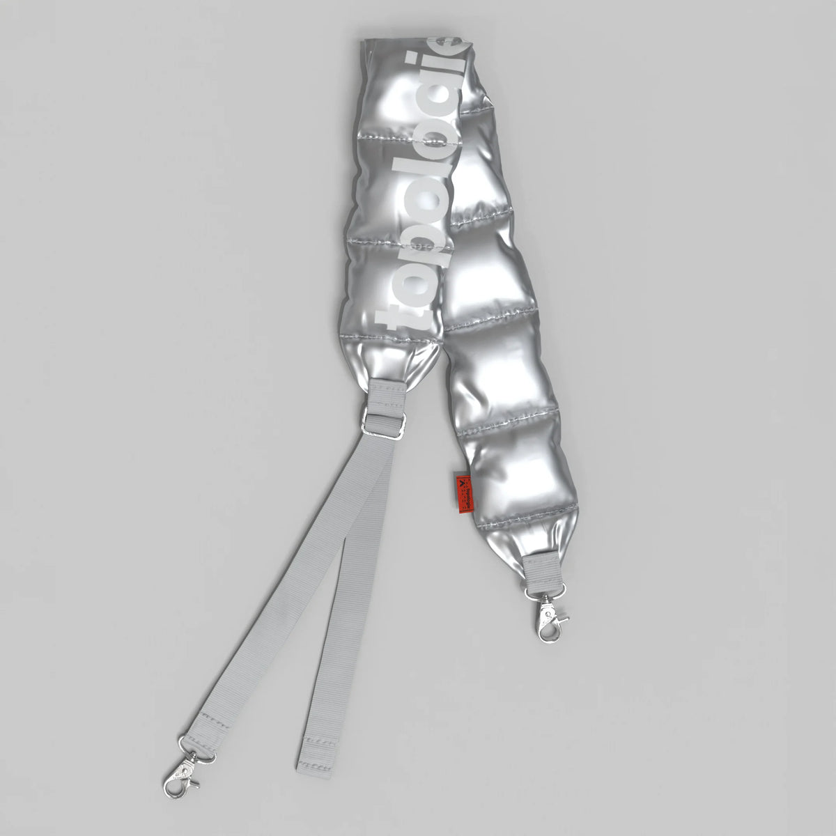 Puffer Strap Chrome Space Coated adjustable strap with heavy-duty clasp and wide design in silver color.