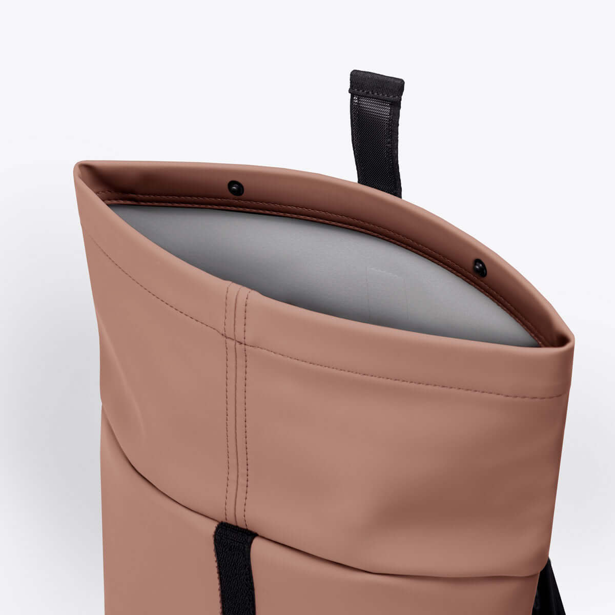Hajo Macro Lotus Redwood Backpack roll-top closure detail showcasing waterproof material.