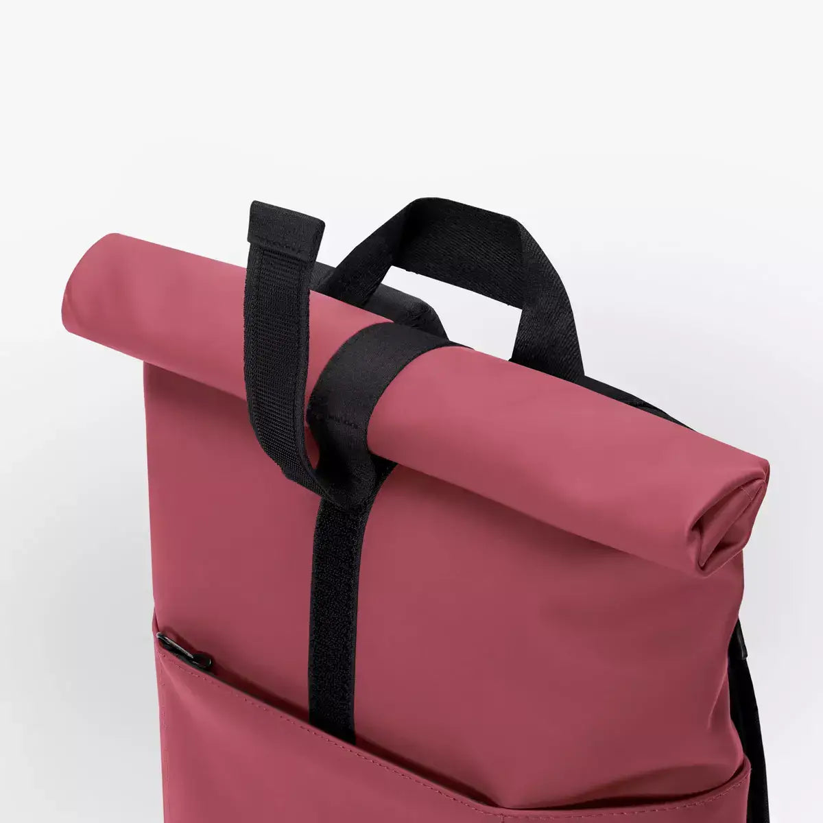 Hajo Lotus Infinity Burgundy Backpack showing the rolled top and padded strap for comfort and style.
