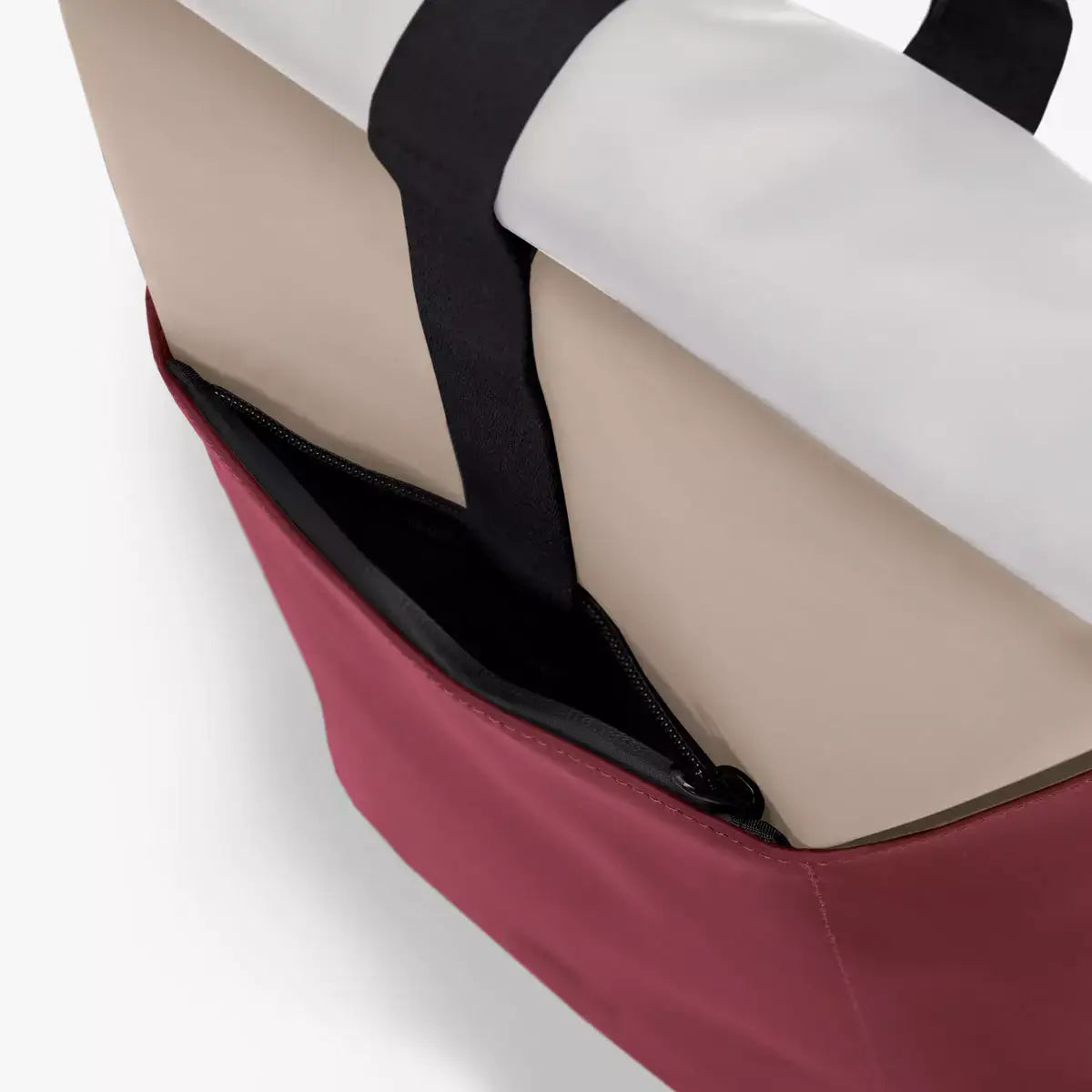 Hajo Lotus Infinity Sand Burgundy Backpack showing interior and side zipper detail.