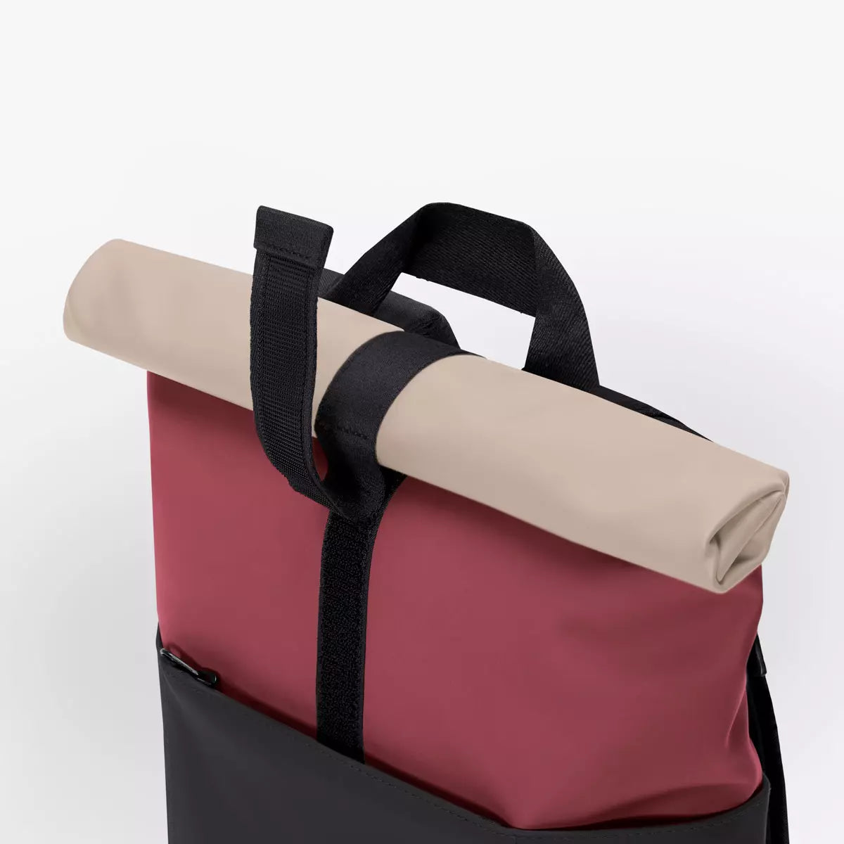 Hajo Mini Lotus Infinity Burgundy Black Backpack with rolled top and strap detail.