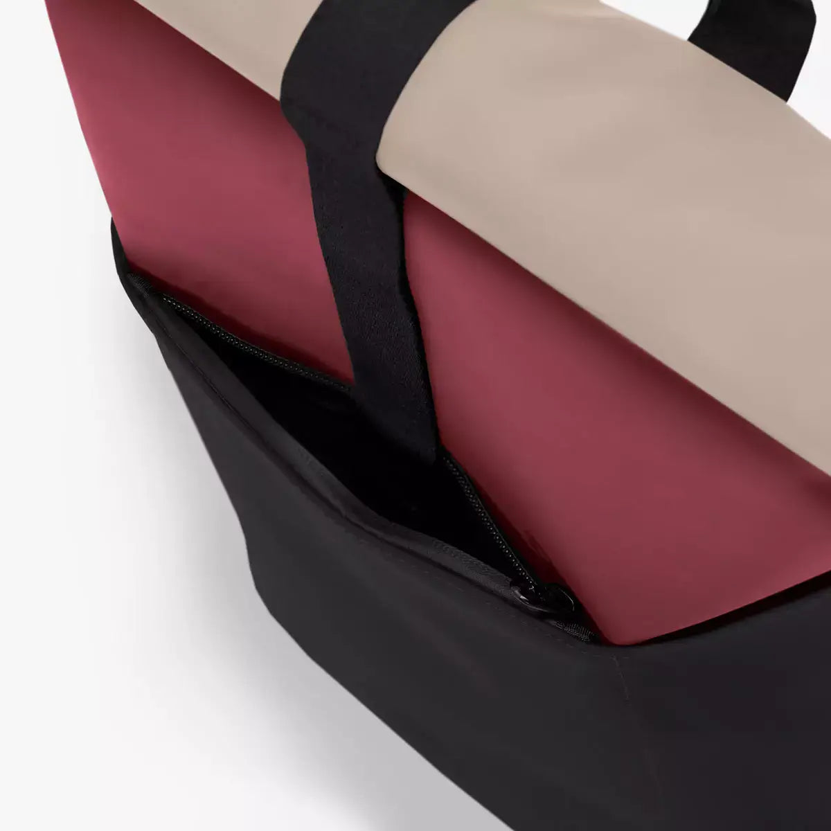 Hajo Mini Lotus Infinity Burgundy Black Backpack showing interior compartment with zipper and padded straps