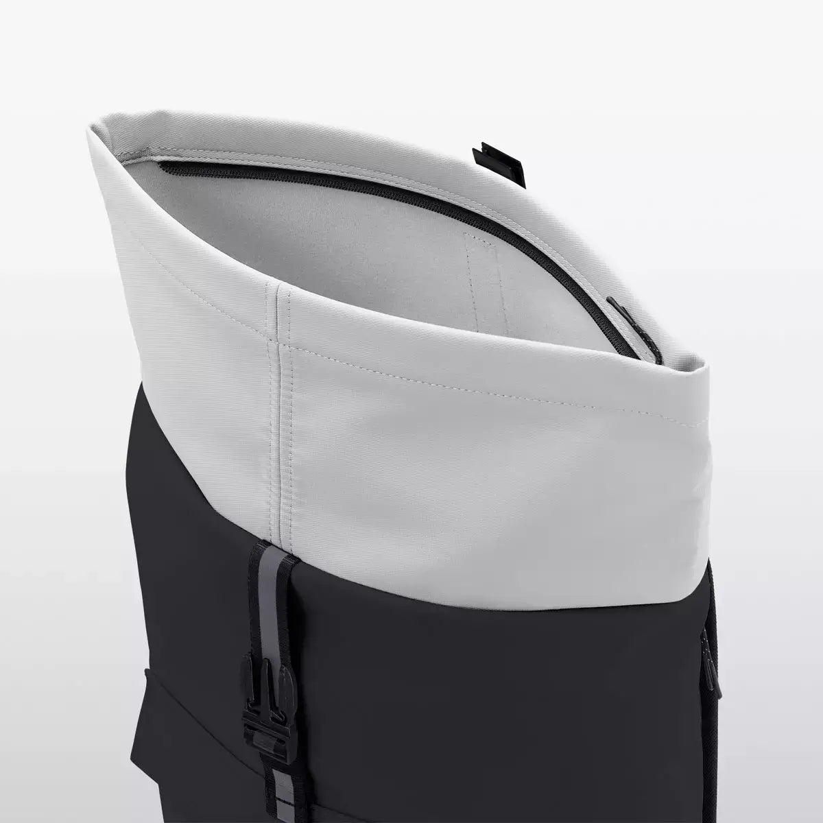 Jannik Medium Aloe Black Light Grey Backpack showing the waterproof roll-top closure detail.