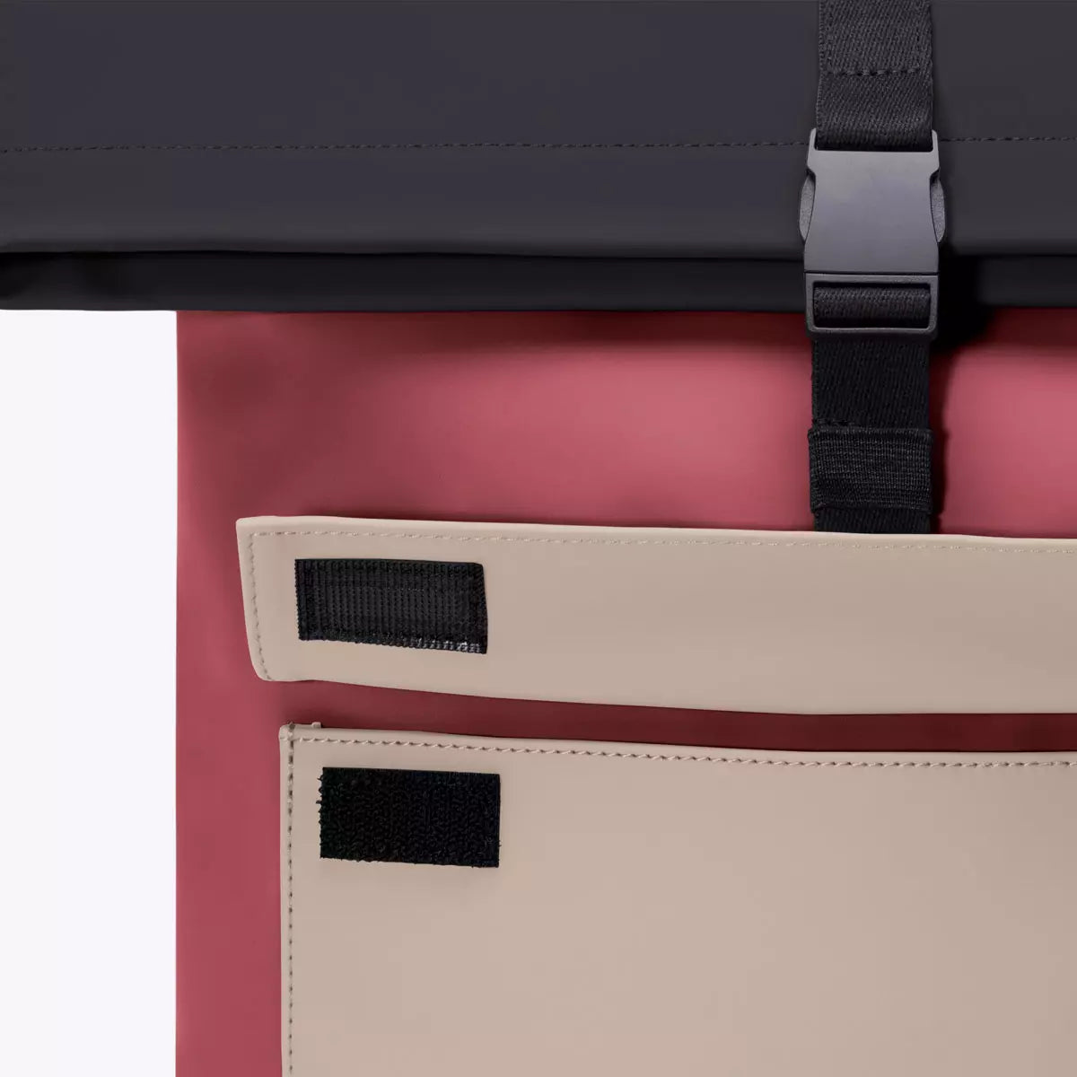 Jannik Medium Lotus Infinity Burgundy Sand Backpack details showing roll-top closure and side zipper