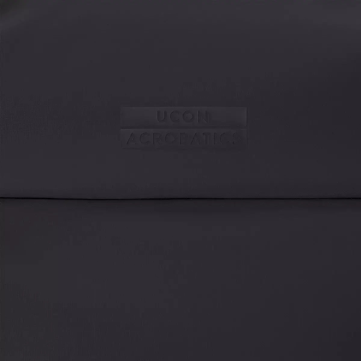 Olivia Large Moss Black Shoulder Bag featuring a smooth black surface with embossed branding for a sleek look.