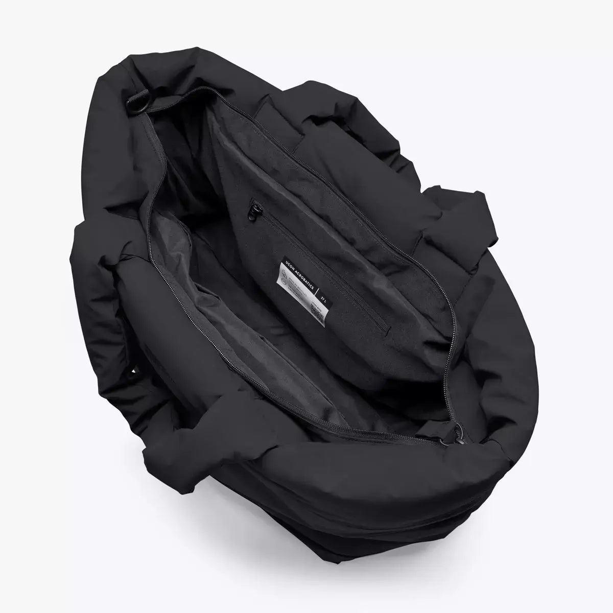 Interior view of Olivia Large Moss Black Shoulder Bag showing multiple pockets and compartments.