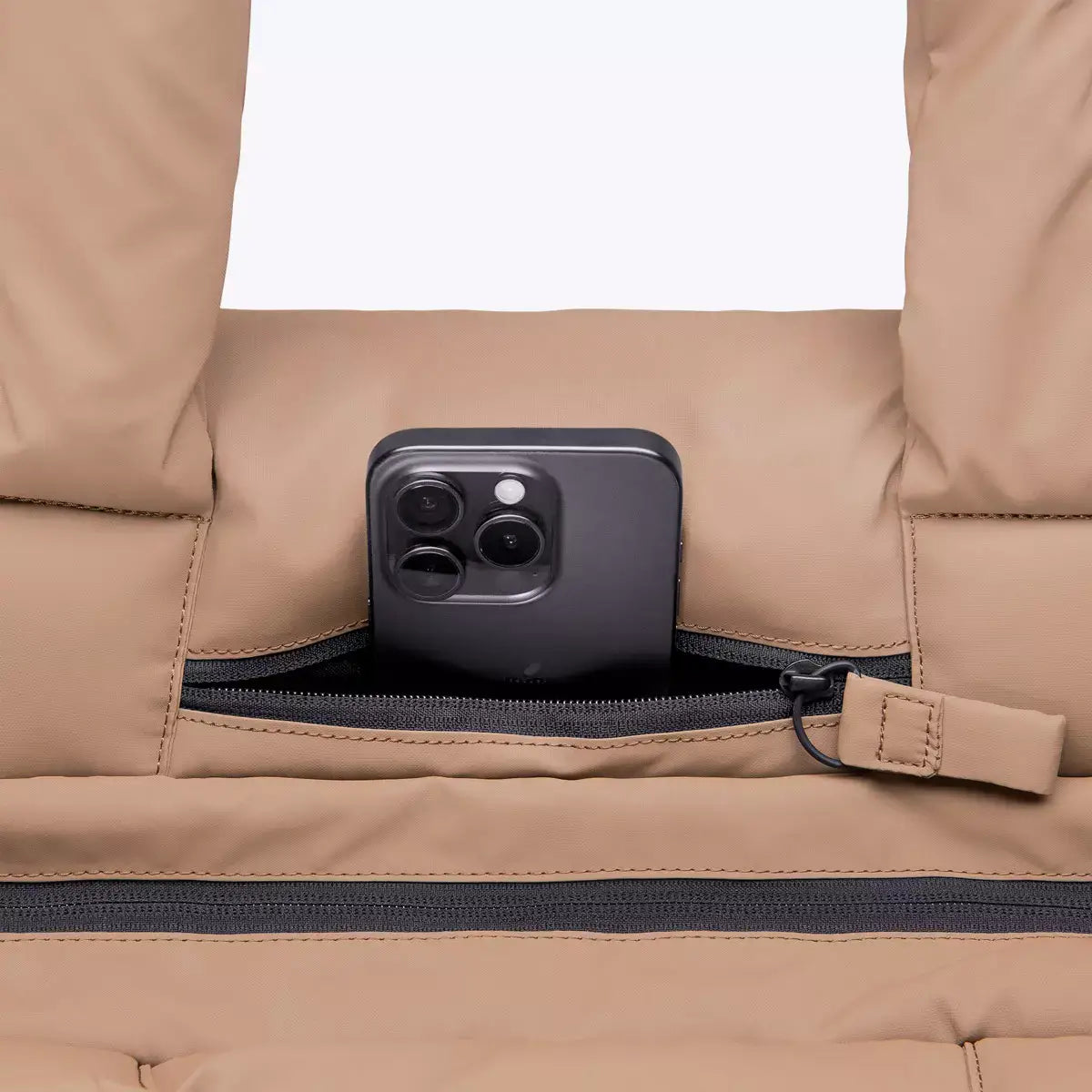 Smartphone in zippered front pocket of the Olivia Large Moss Earth Shoulder Bag.