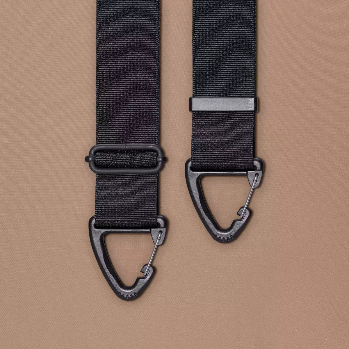 Olivia Large Moss Earth Shoulder Bag adjustable straps and metal clips on a beige background.