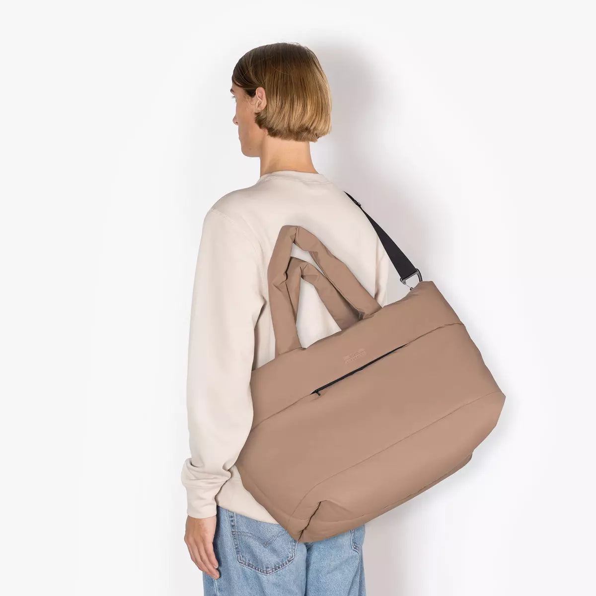 Olivia Large Moss Earth Shoulder Bag showcased on a model from the back, featuring a modern and stylish design.