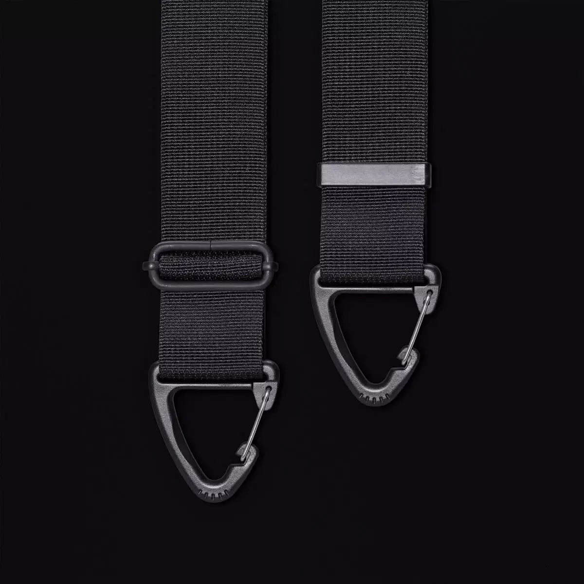 Olivia Medium Moss Black Shoulder Bag adjustable and detachable shoulder strap with metal clips on a black background.