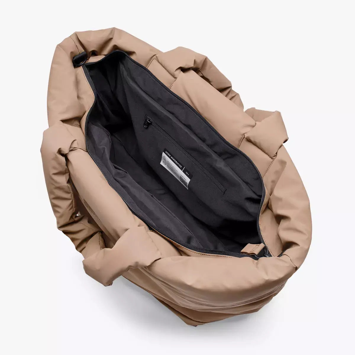 Interior view of Olivia Medium Moss Earth Shoulder Bag showcasing spacious compartment and pockets.