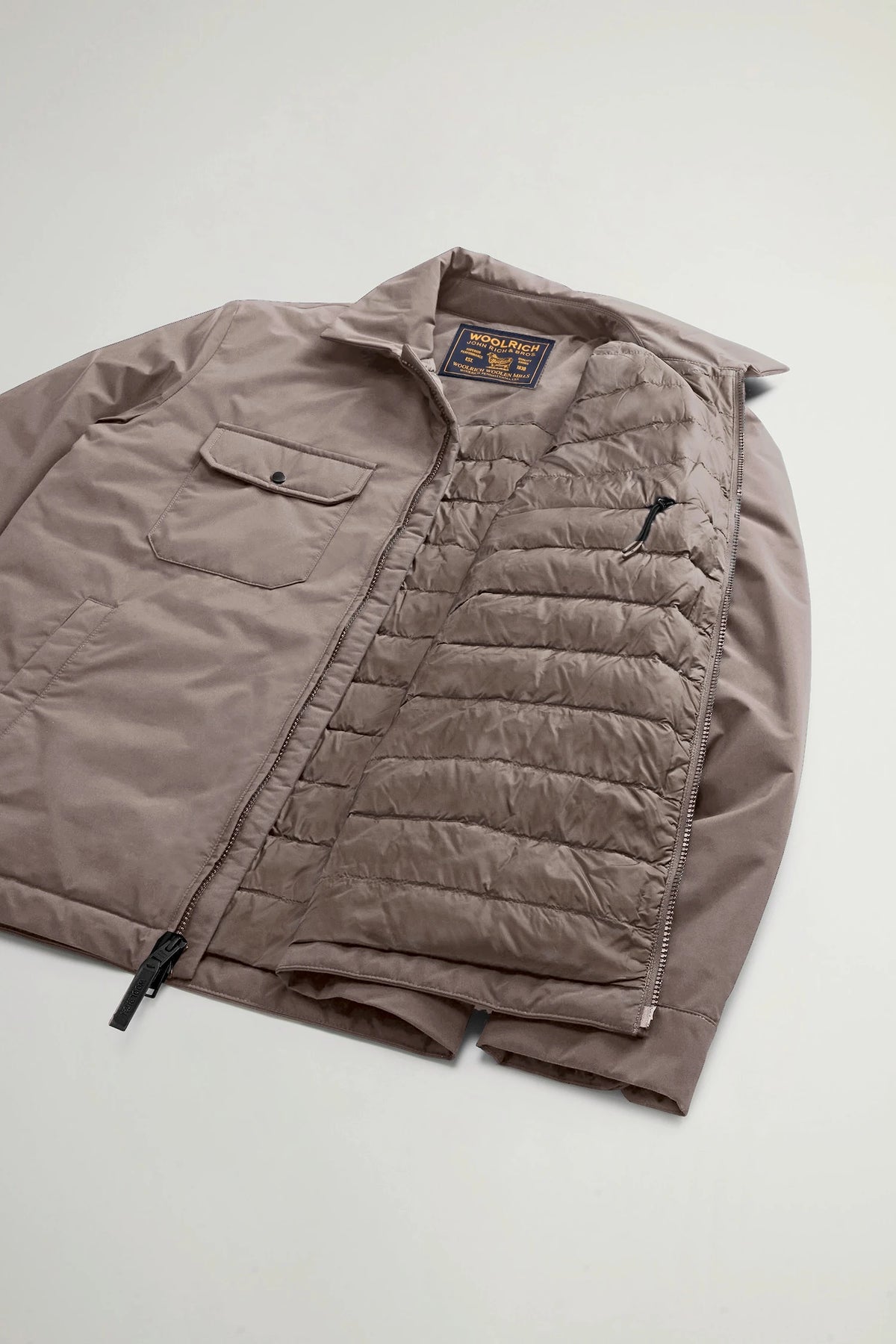 Cloud Overshirt Falcon by Woolrich, premium down filled overshirt in muted brown, ideal for transitional weather.