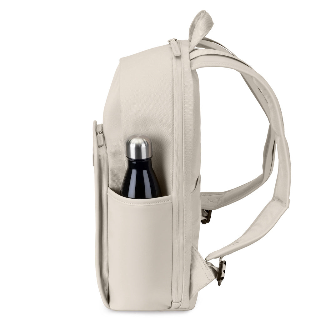 Side view of Aalborg Sandstone Backpack with a water bottle in side pocket, showcasing its minimalist design.